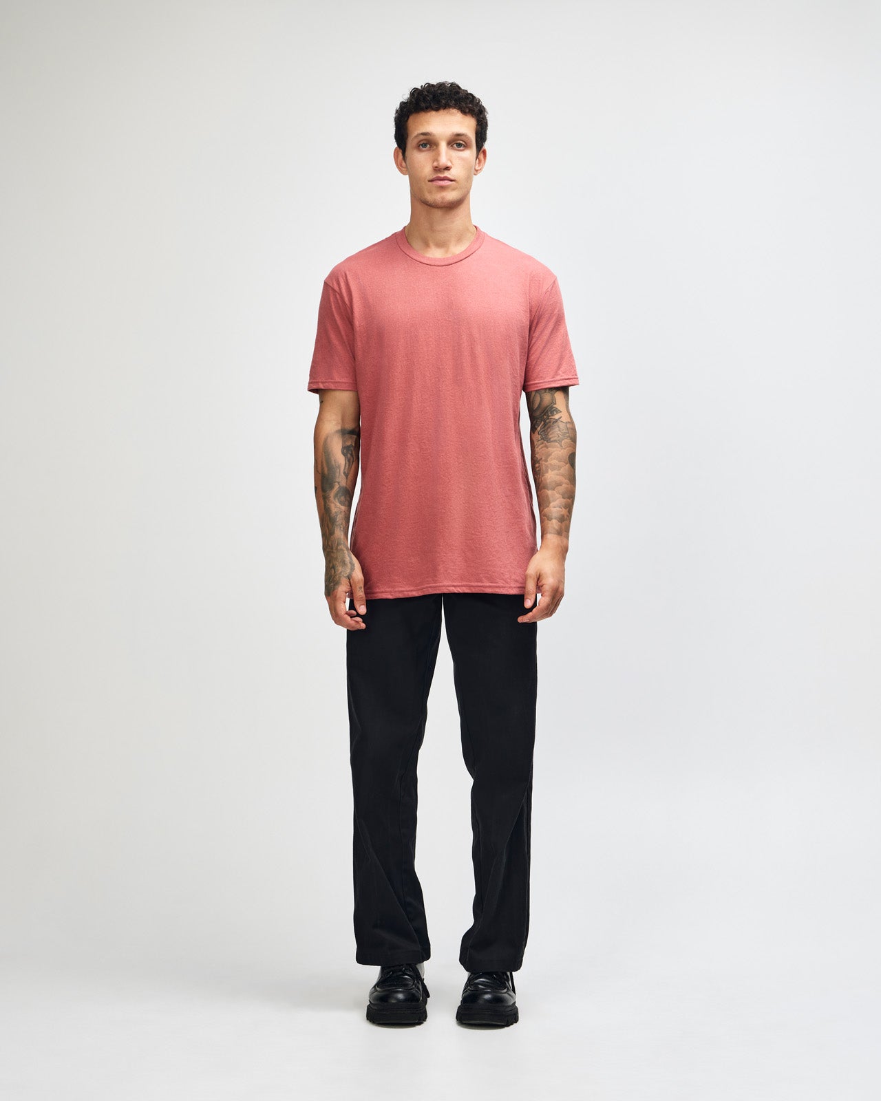 Male model wearing heather canyon colour CVC Unisex Short Sleeve Crew Neck Tee (front pose) -heather canyon