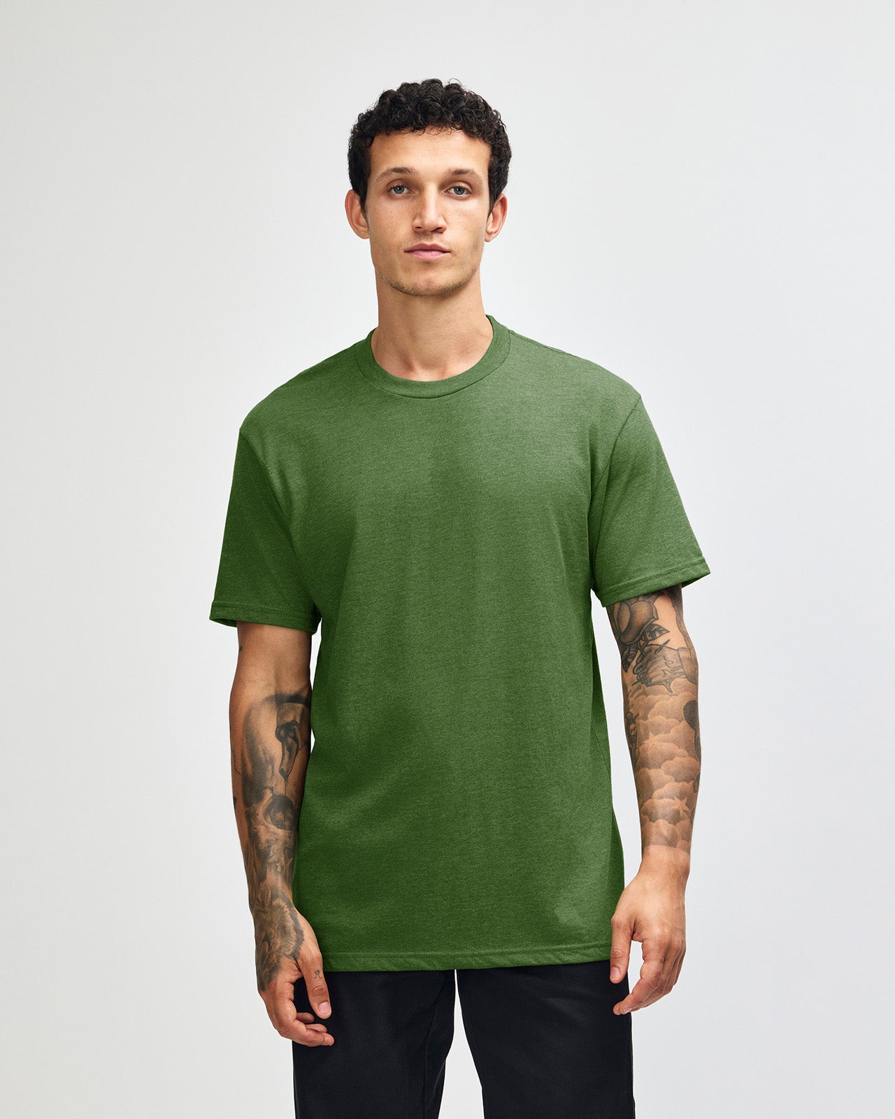 Male model wearing heather olive colour CVC Unisex Short Sleeve Crew Neck Tee (front pose) -heather olive