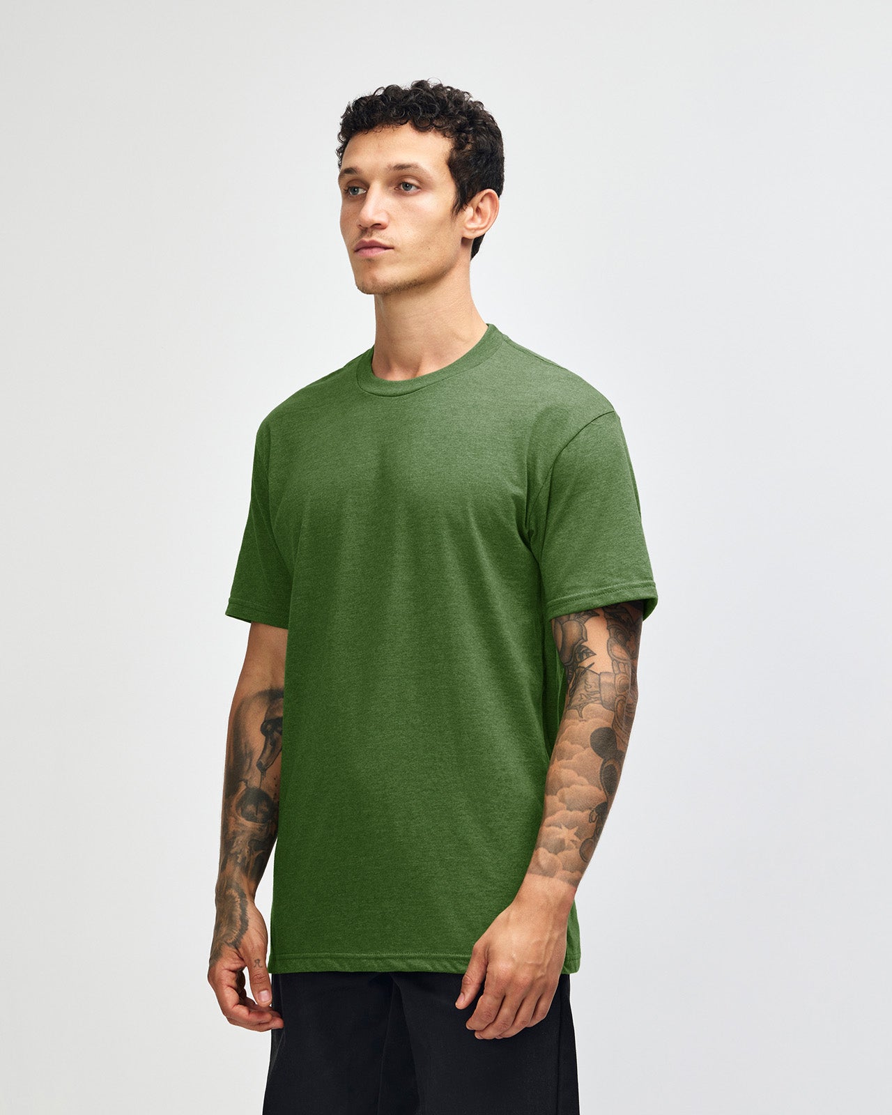 Male model wearing heather olive colour CVC Unisex Short Sleeve Crew Neck Tee (front pose) -heather olive