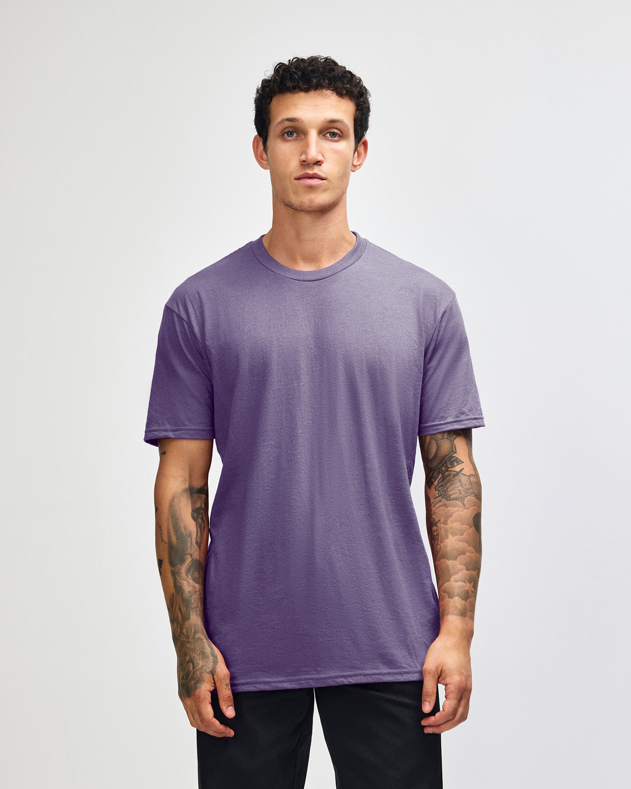 Male model wearing heather purple colour CVC Unisex Short Sleeve Crew Neck Tee (front pose) -heather purple