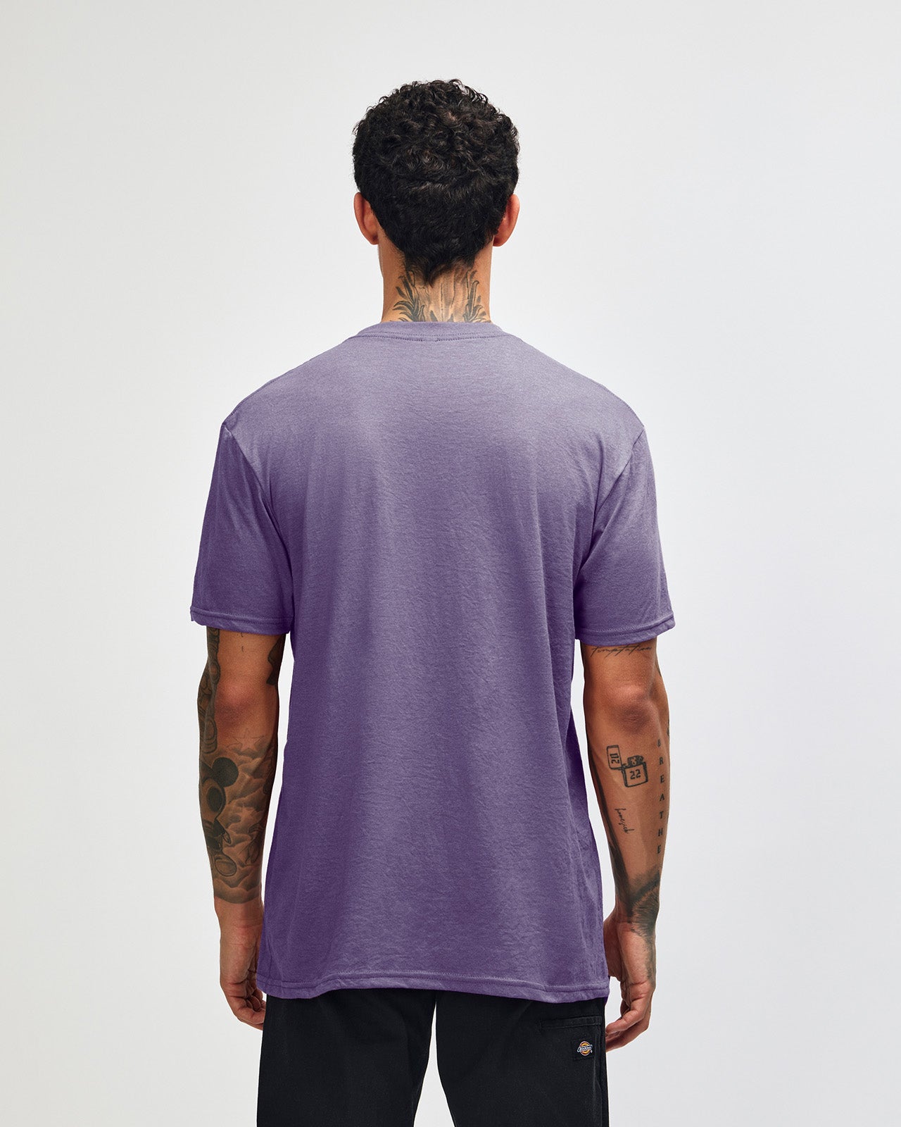 Male model wearing heather purple colour CVC Unisex Short Sleeve Crew Neck Tee (back pose) -heather purple