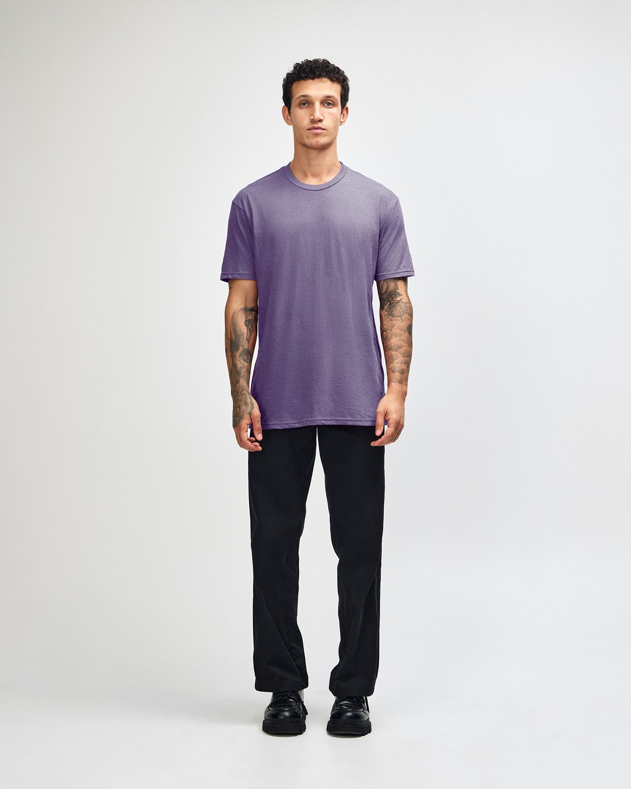 Male model wearing heather purple colour CVC Unisex Short Sleeve Crew Neck Tee (front pose) -heather purple
