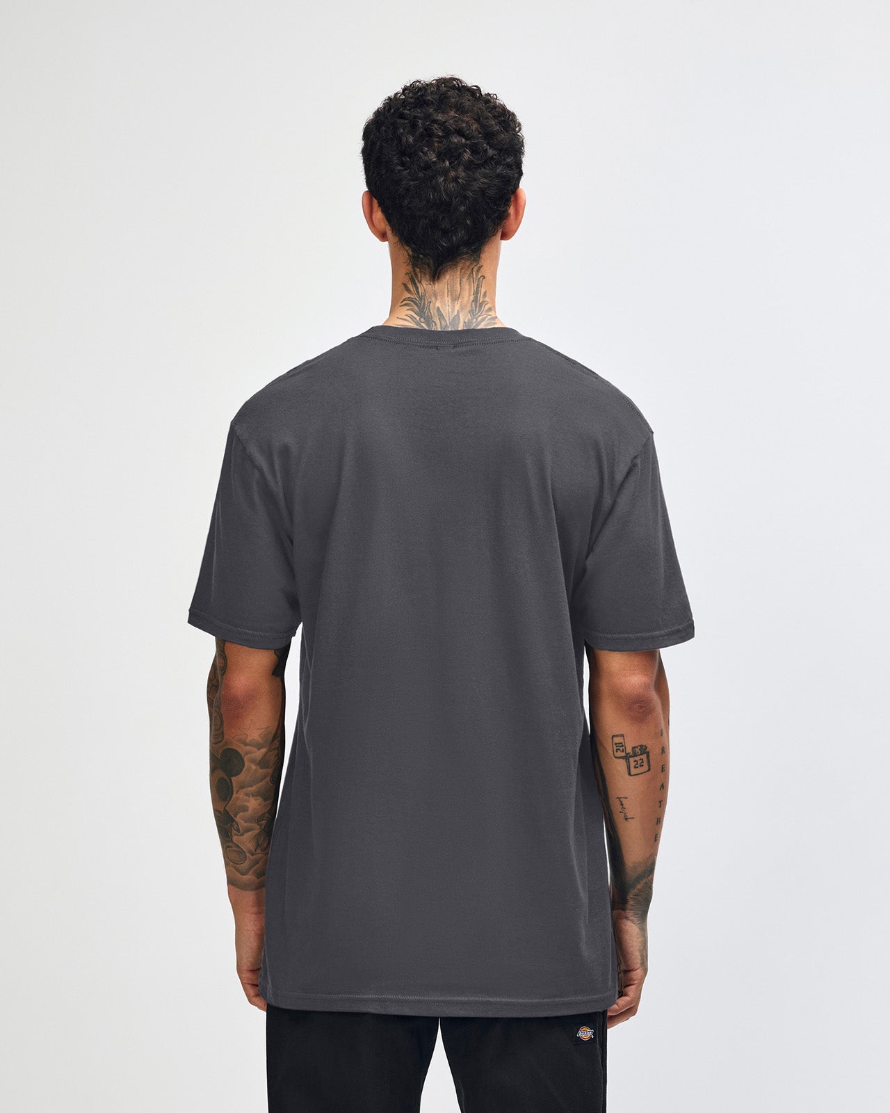 Fine Jersey Male mode wearing Asphalt colour American Apparel Unisex Short Sleeve Crew Neck Tee (back pose) -asphalt