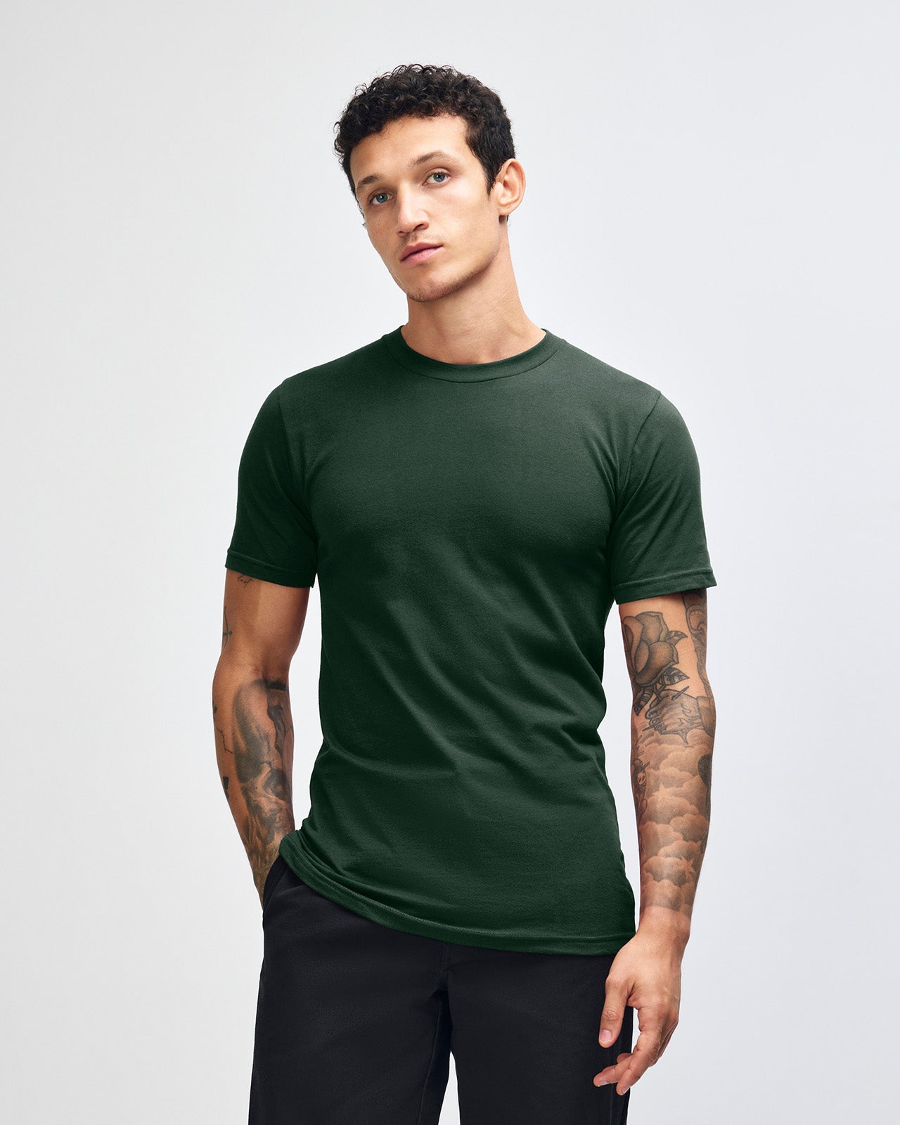 Male mode wearing forest colour American Apparel Fine jersey Unisex Short Sleeve Crew Neck Tee (Front pose) -forest 