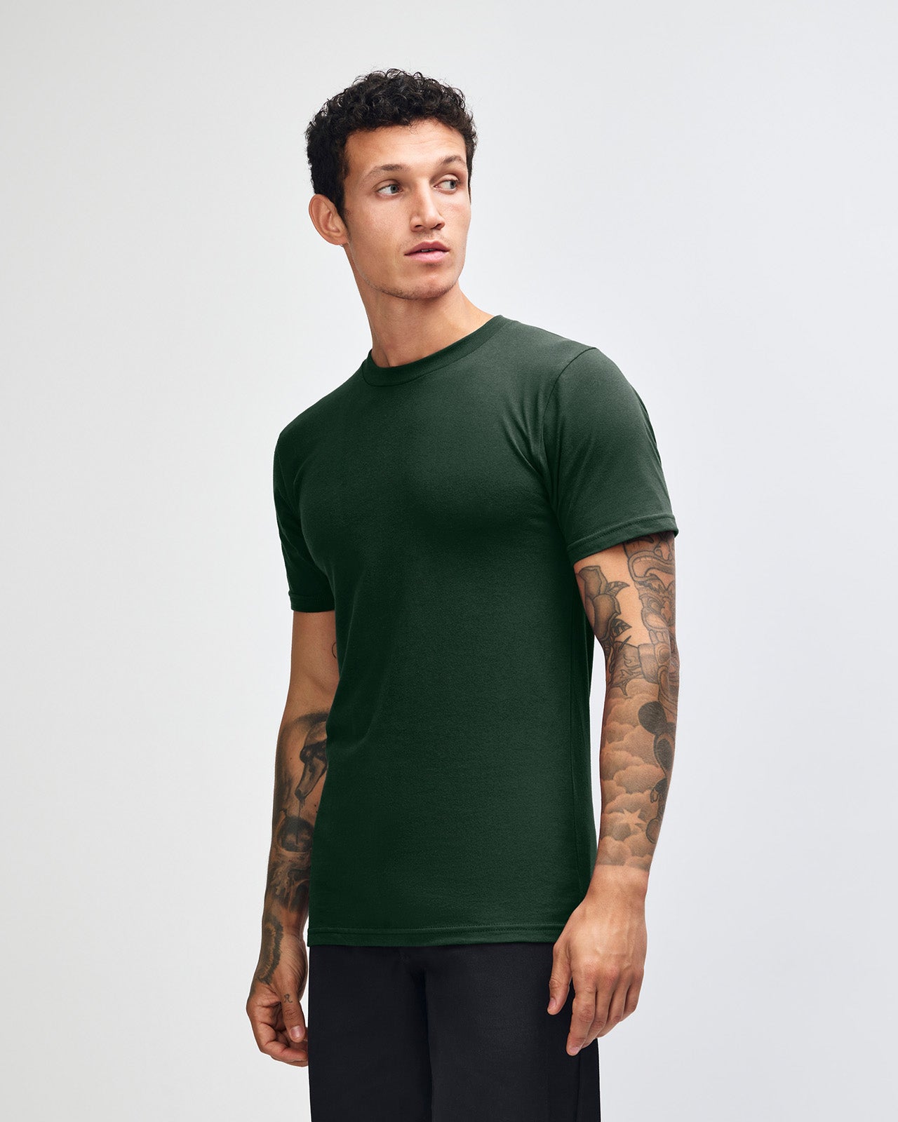 Male mode wearing forest colour American Apparel Fine jersey Unisex Short Sleeve Crew Neck Tee (Front pose) -forest 