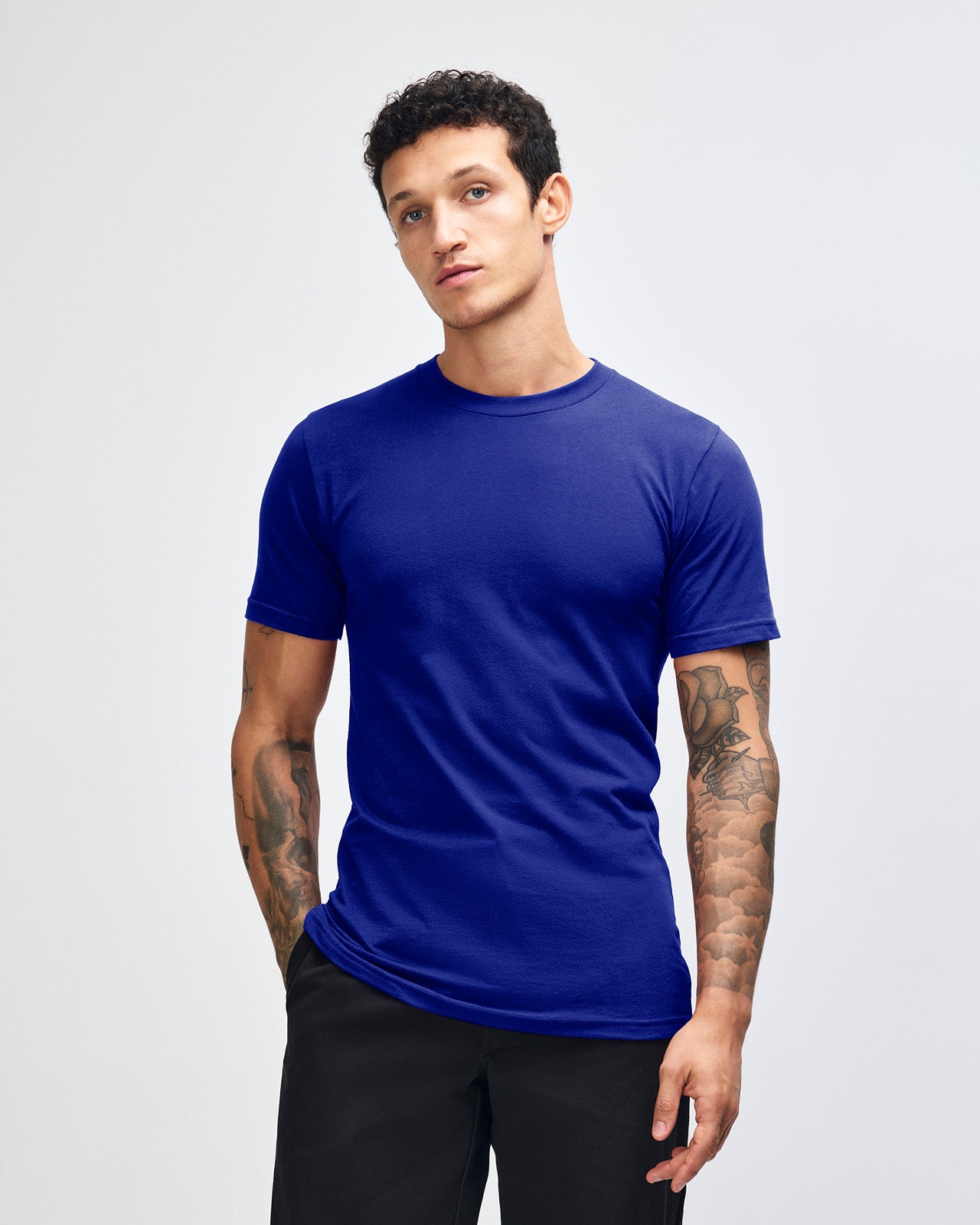 male model wearing  Lapis colour Fine Jersey Unisex Crew Neck Tee (front pose) -lapis