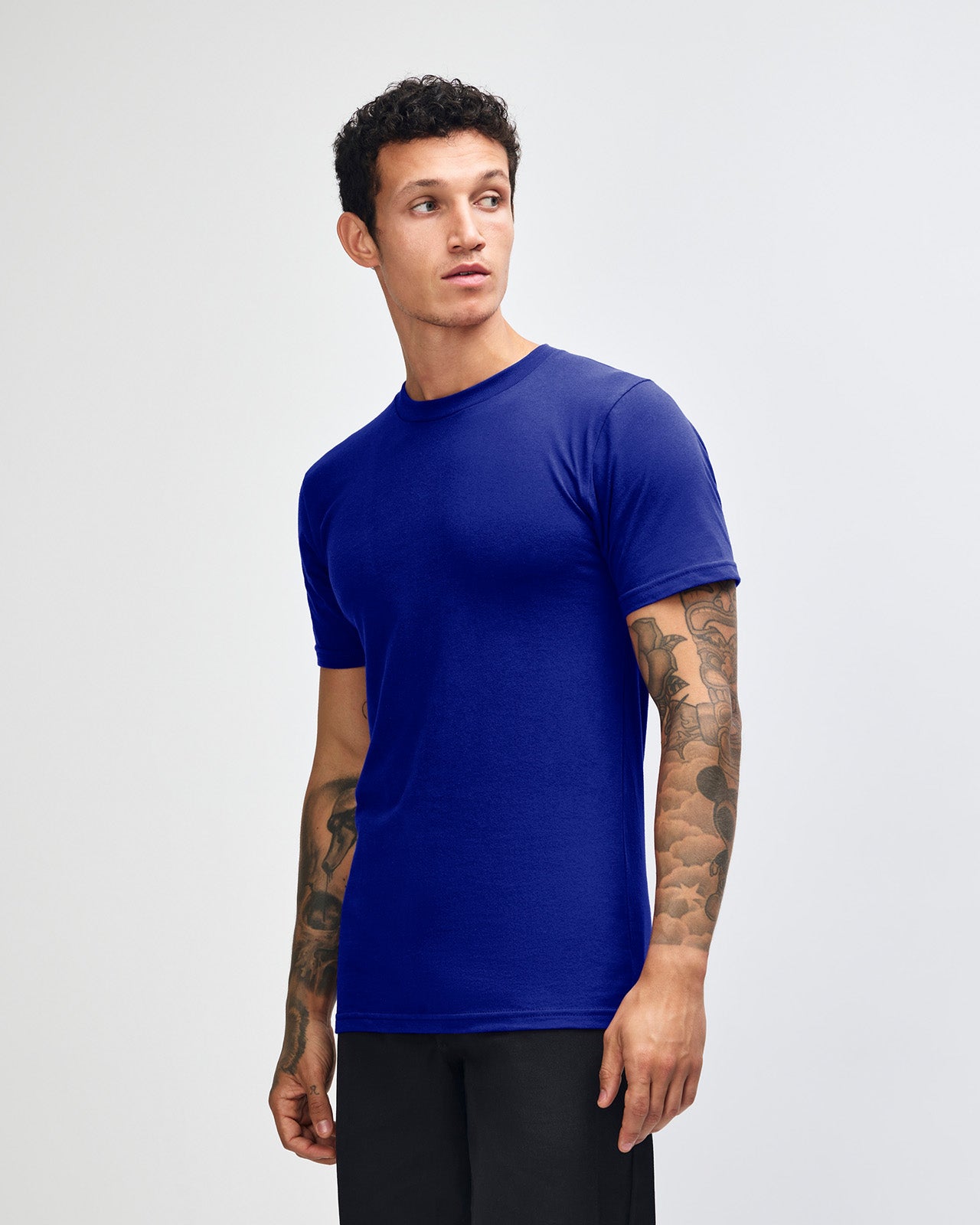 male model wearing  Lapis colour Fine Jersey Unisex Crew Neck Tee (front pose) -lapis