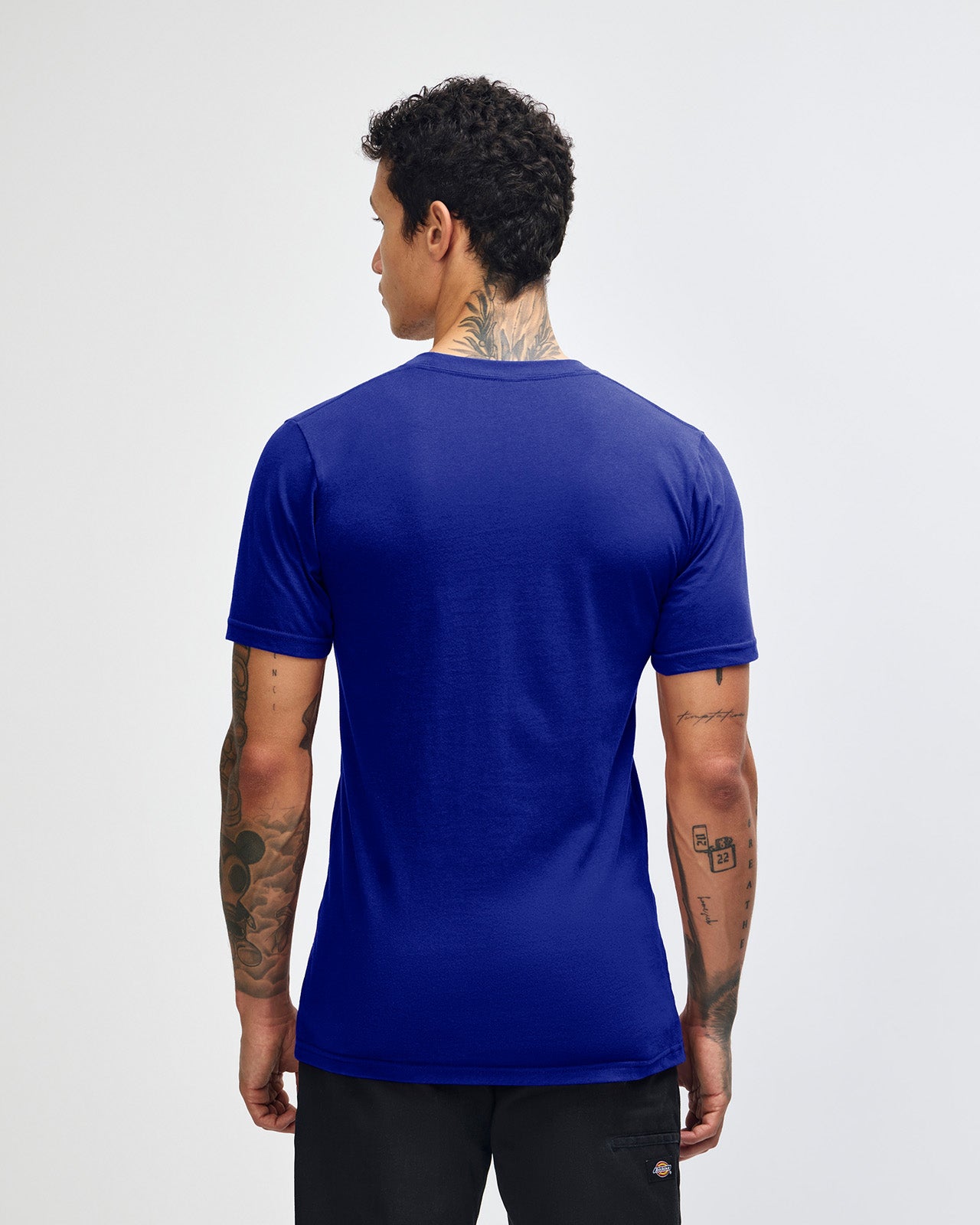 male model wearing  Lapis colour Fine Jersey Unisex Crew Neck Tee (back pose) -lapis