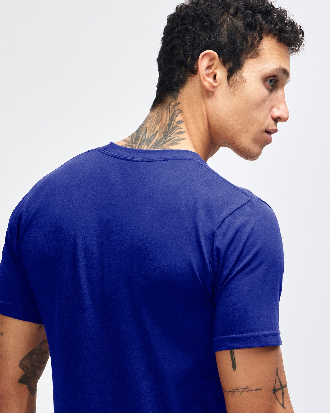 male model wearing  Lapis colour Fine Jersey Unisex Crew Neck Tee (back pose) -lapis