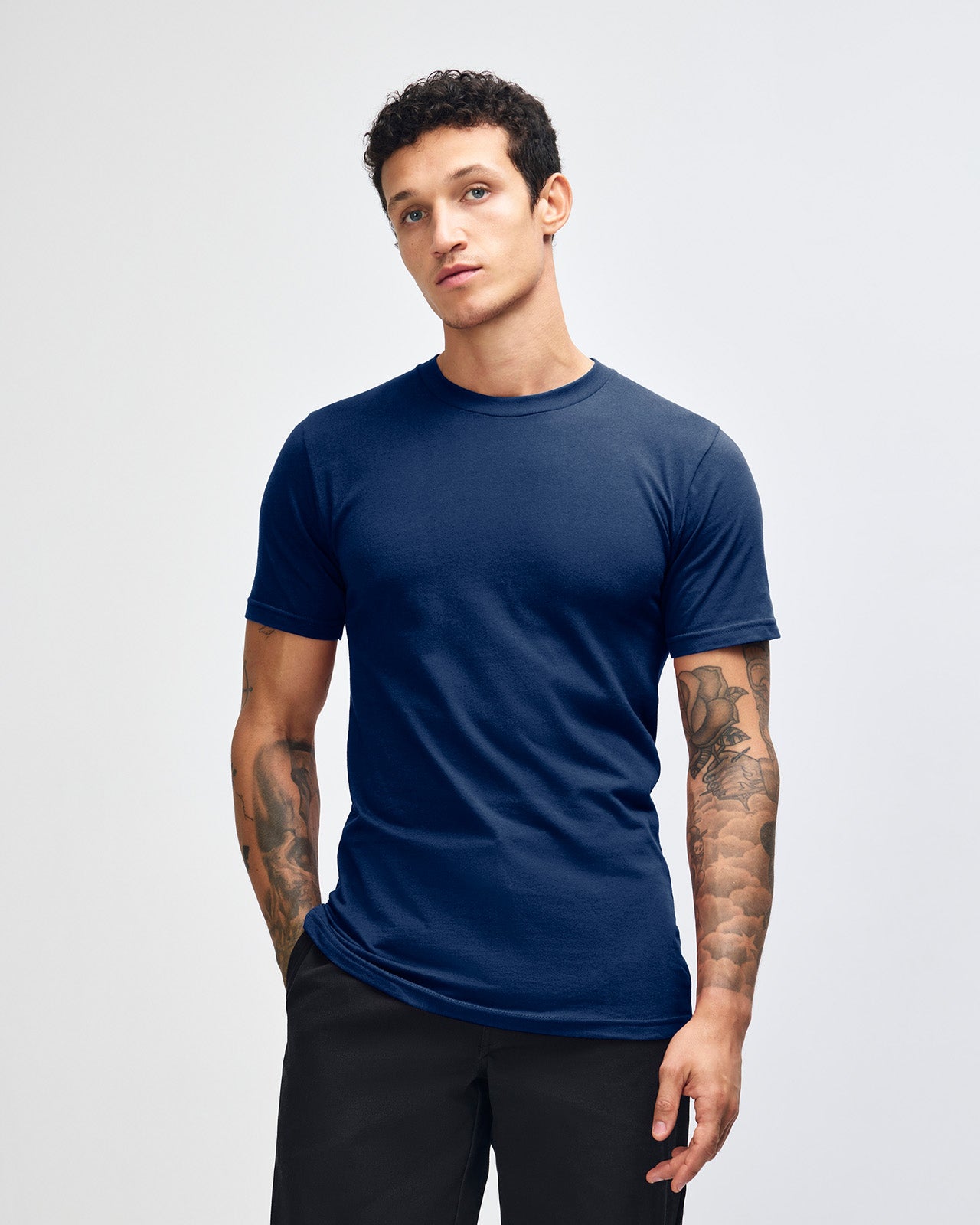 male model wearing  Navy colour Fine Jersey Unisex Crew Neck Tee (front pose) -navy