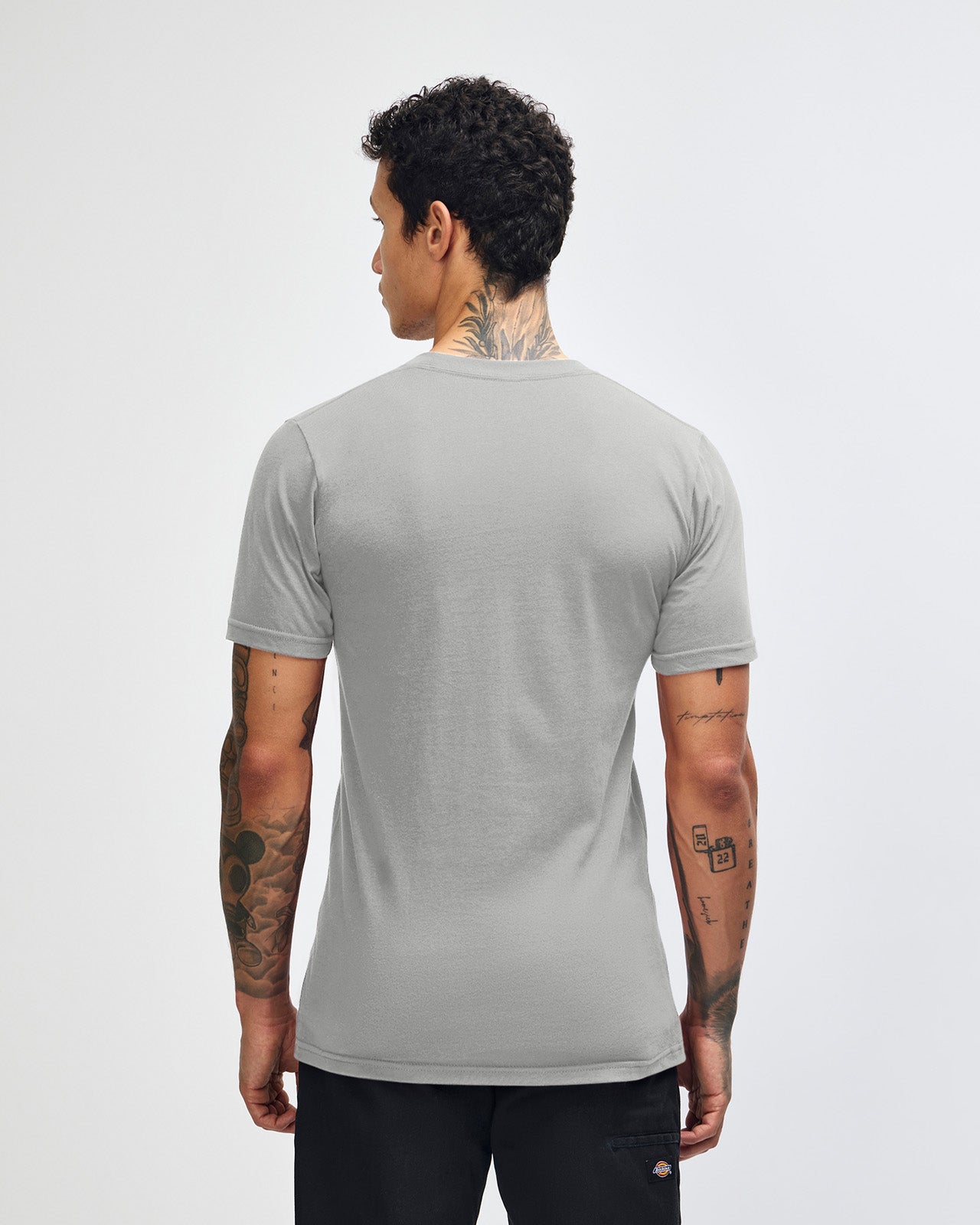 male model wearing  new silver colour Fine Jersey Unisex Crew Neck Tee (back pose) -new silver