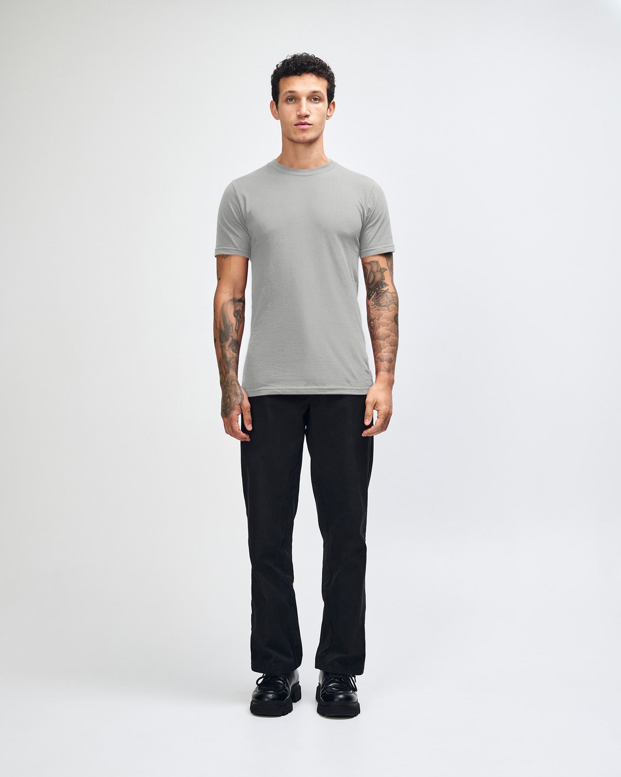 male model wearing  new silver colour Fine Jersey Unisex Crew Neck Tee (front pose) -new silver