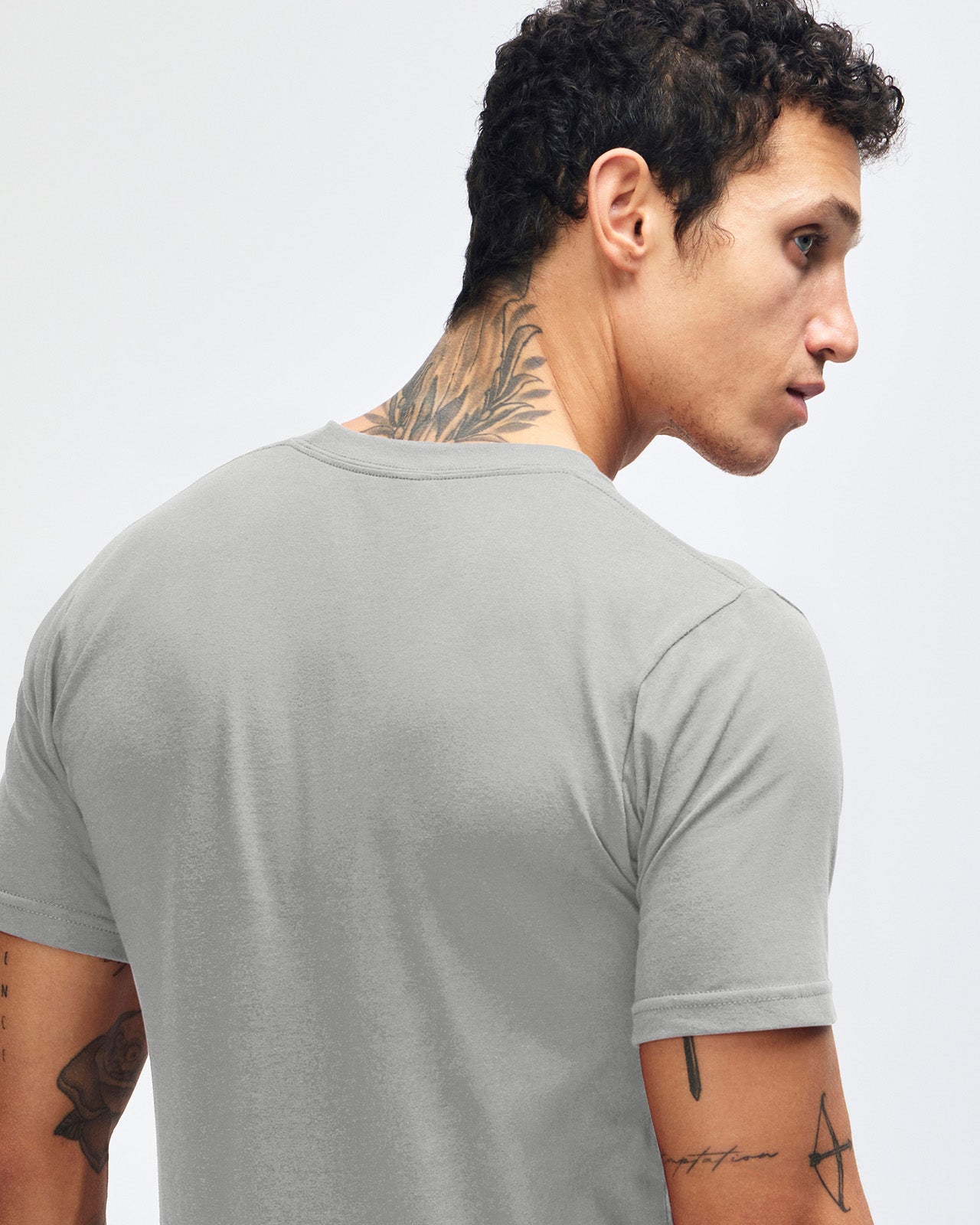 male model wearing  new silver colour Fine Jersey Unisex Crew Neck Tee (back pose) -new silver