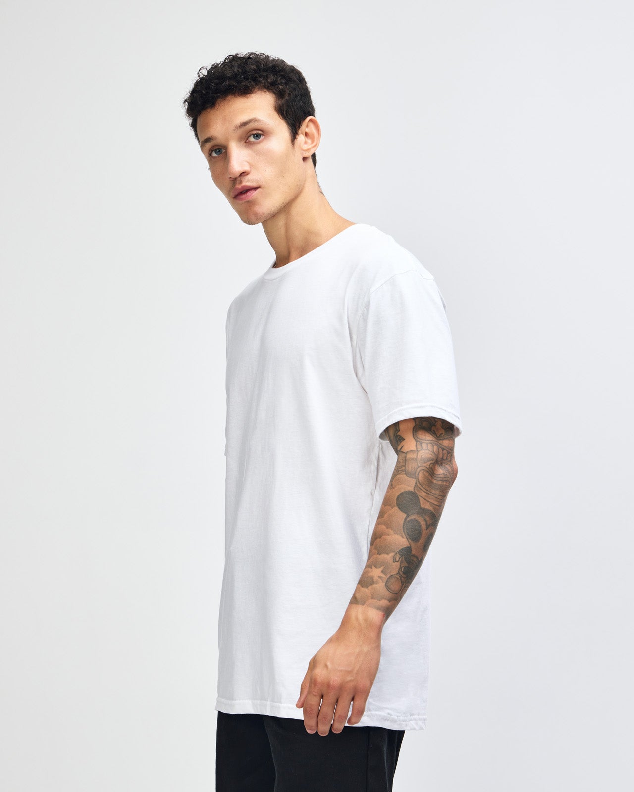 Male model wearing white colour CVC Unisex Short Sleeve Crew Neck Tee (front pose) -white