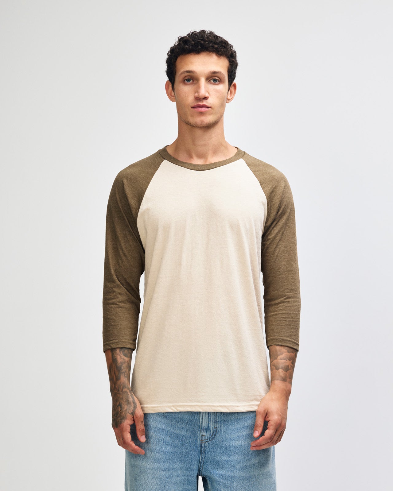 Male model wearing Heather Bone American Apparel CVC unisex raglan Tee (Front  pose) -heather bone