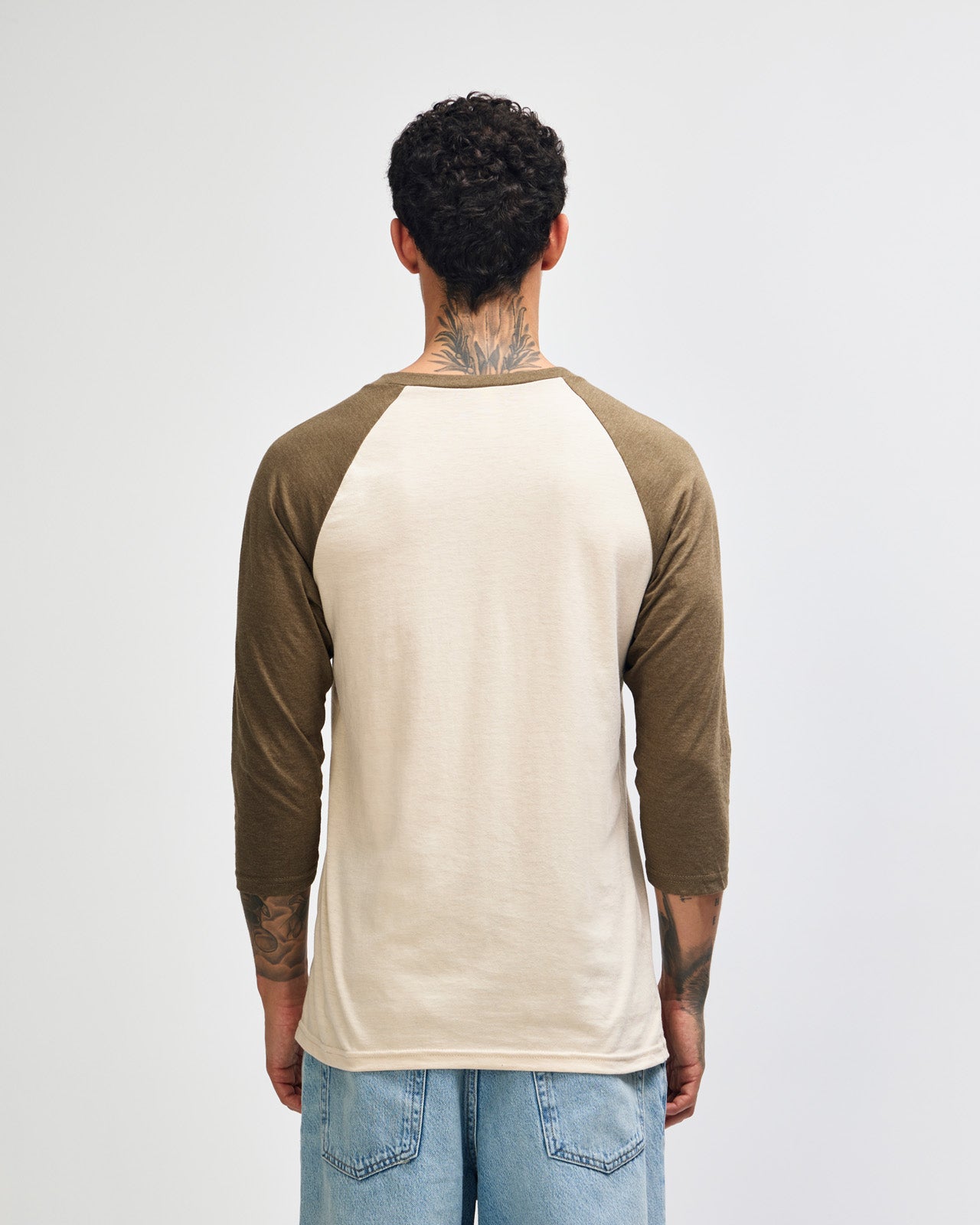 Male model wearing Heather Bone American Apparel CVC unisex raglan Tee (Front  pose) -heather bone
