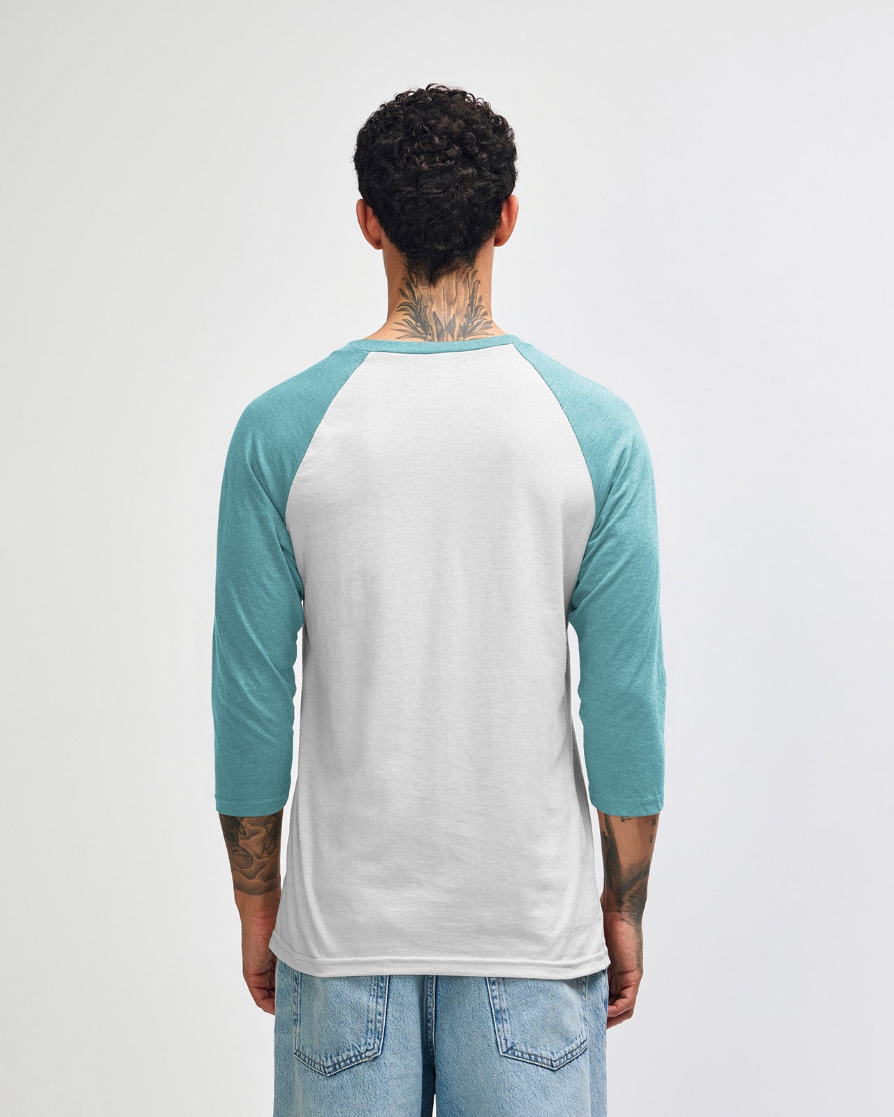 Male model wearing Heather Arctic American Apparel CVC unisex raglan Tee (back pose) -heather arctic 