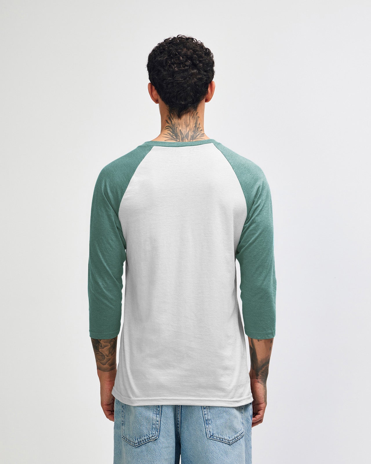 Male model wearing Heather Arctic American Apparel CVC unisex raglan Tee (Back pose) -heather arctic 