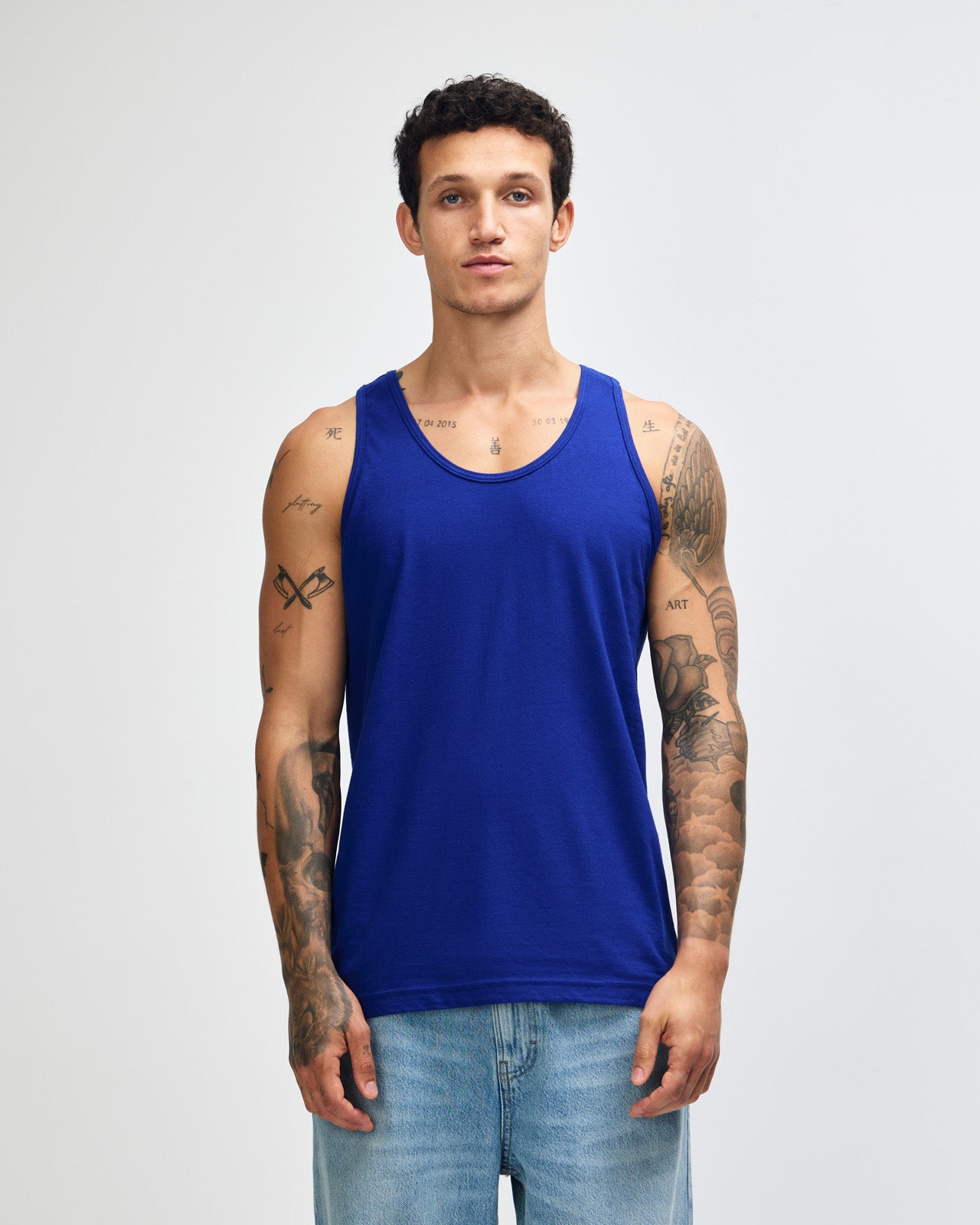 Male model wearing heather grey colour American Apparel Fine Jersey Unisex Tank Top (front pose) -lapis