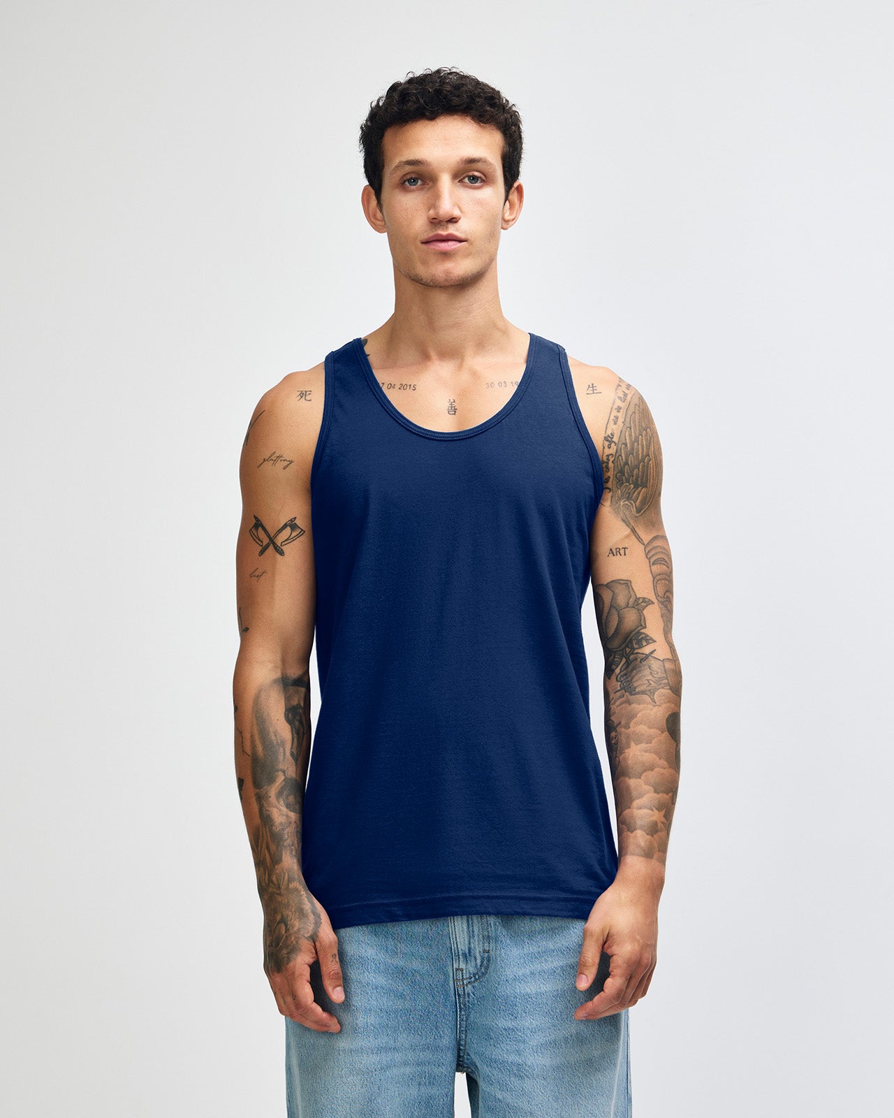 Male model wearing navy colour American Apparel Fine Jersey Unisex Tank Top (front pose) -navy