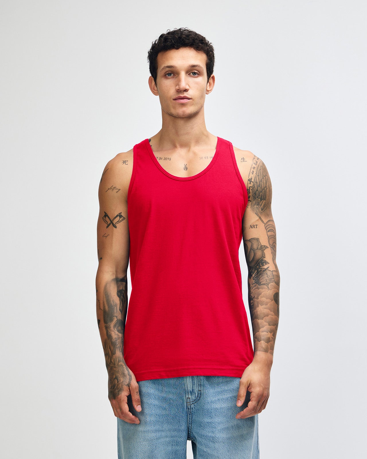 Male model wearing red colour American Apparel Fine Jersey Unisex Tank Top (front pose)-red