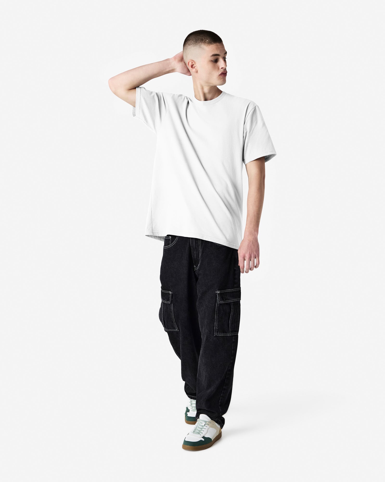 Male model wearing sueded white colour  Unisex Short Sleeve Crew Neck Tee (front pose) -white