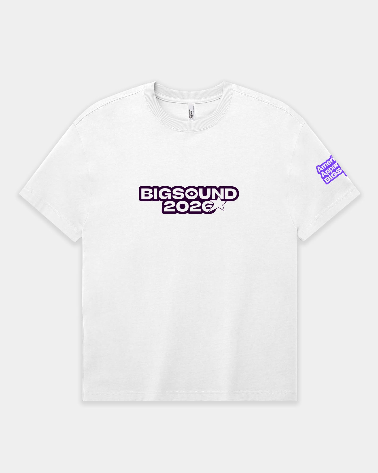 A white short sleeve crewneck tshirt featuring a purple and black BIGSOUND 2026 graphic on the chest and a small purple BIGSOUND 2026 sleeve print, shown against a light gray background -white