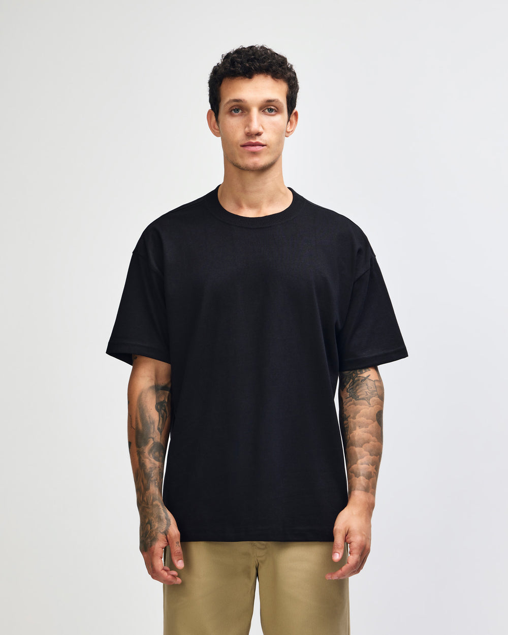 next image of Unisex Super Heavy Tee : Male model wearing an American Apparel 9001 Unisex Oversized Fit Super Heavyweight T-shirt - black