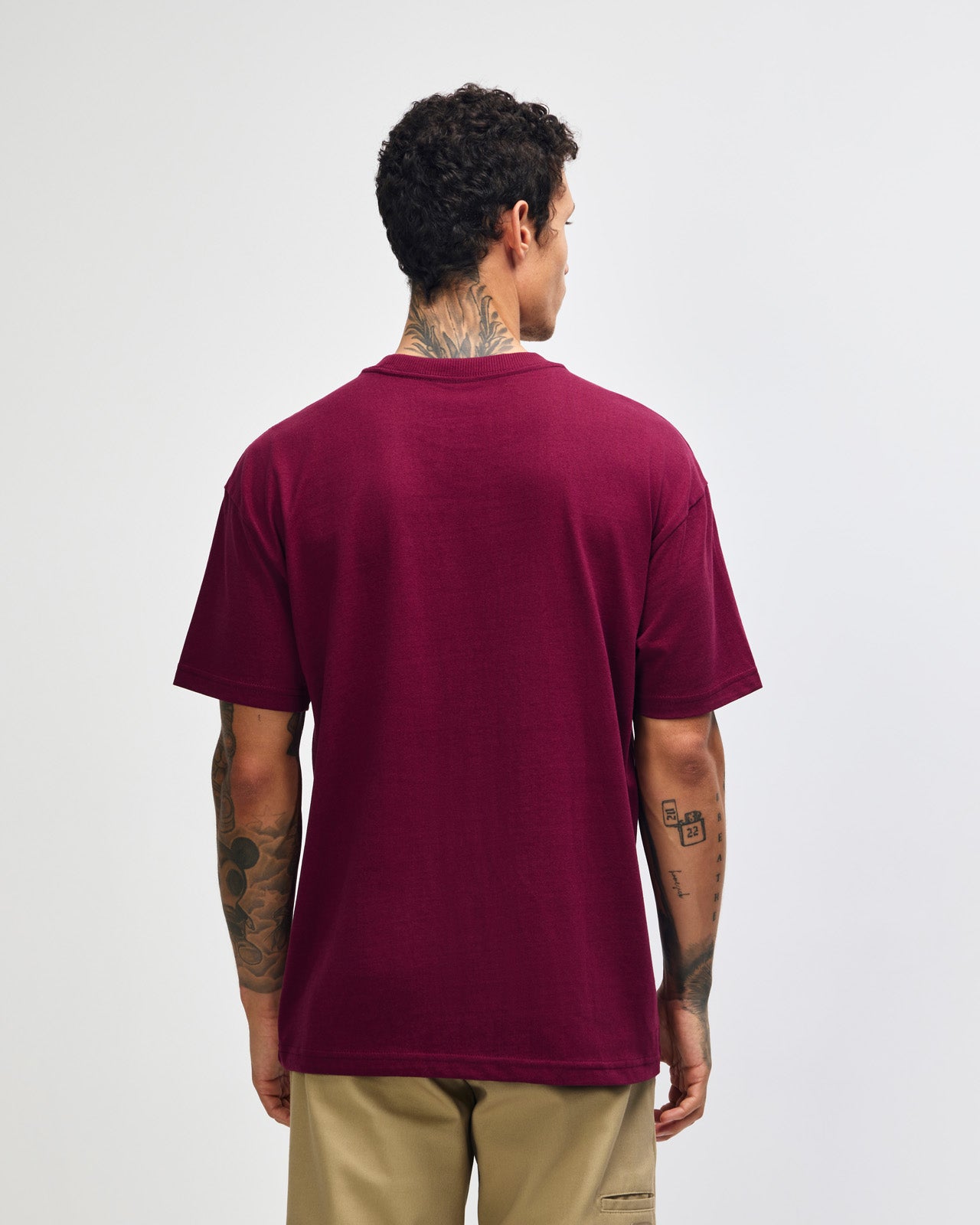 Male model wearing an American Apparel 9001 Unisex Oversized Fit Super Heavyweight T-shirt - burgundy