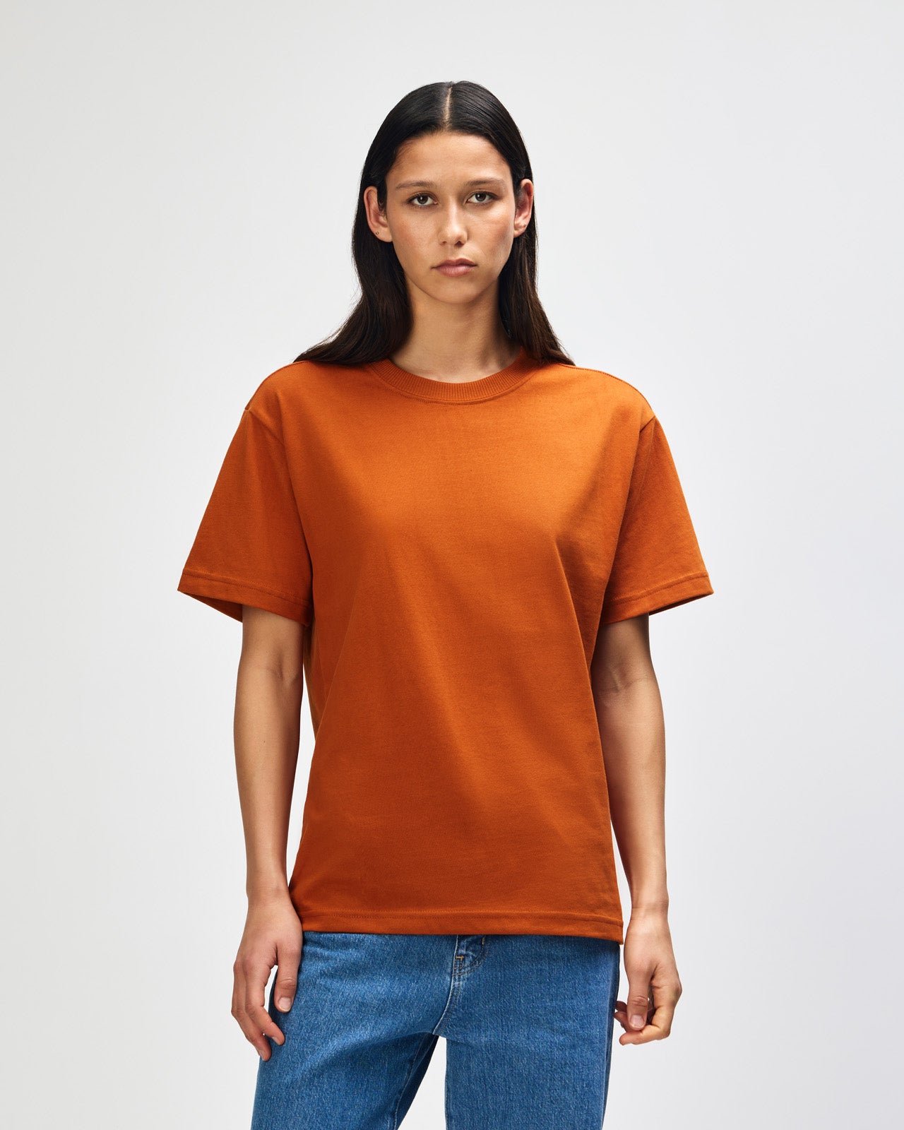 Female model wearing an American Apparel 9001 Unisex Oversized Fit Super Heavyweight T-shirt - Rust
