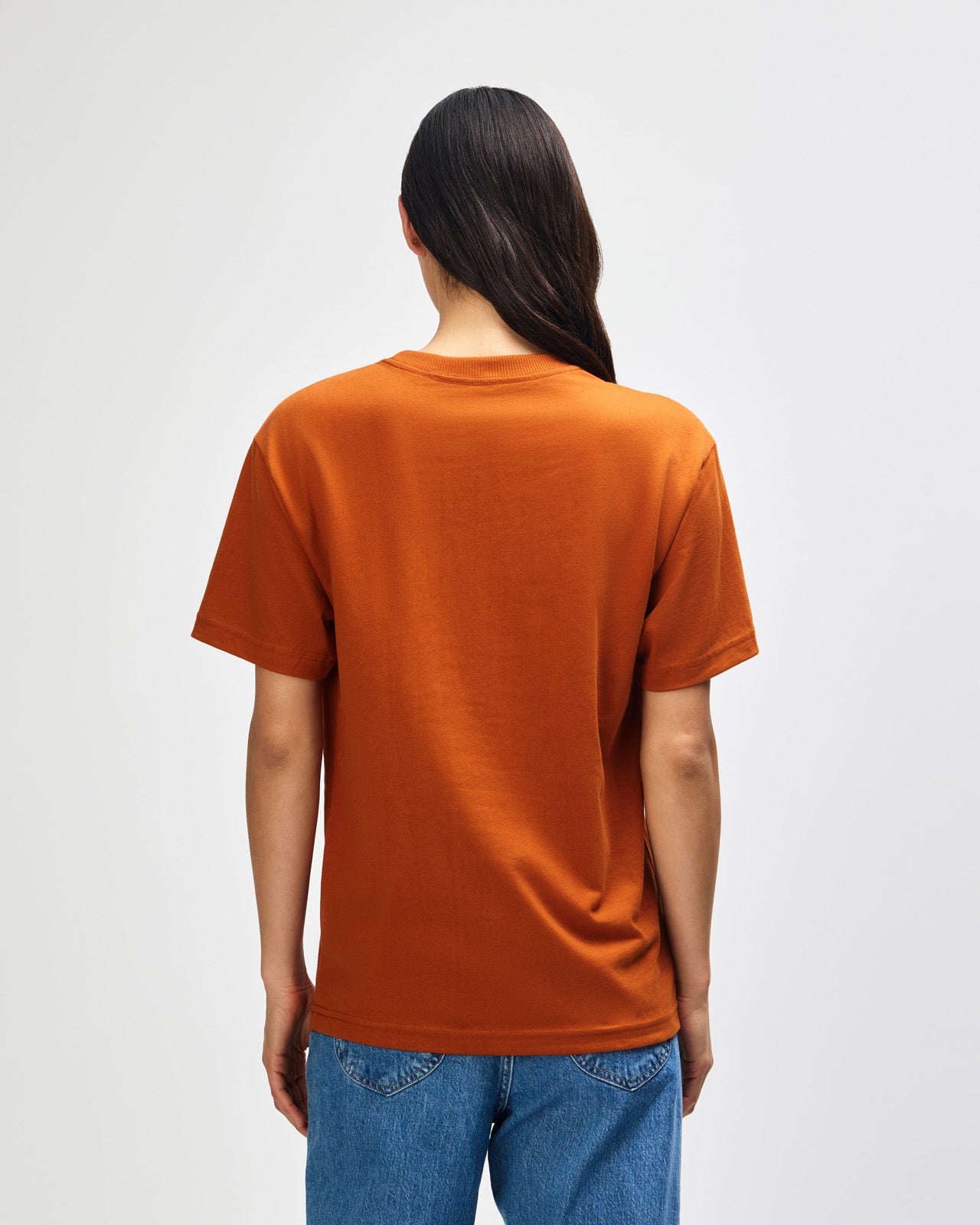 Female model wearing an American Apparel 9001 Unisex Oversized Fit Super Heavyweight T-shirt - Rust