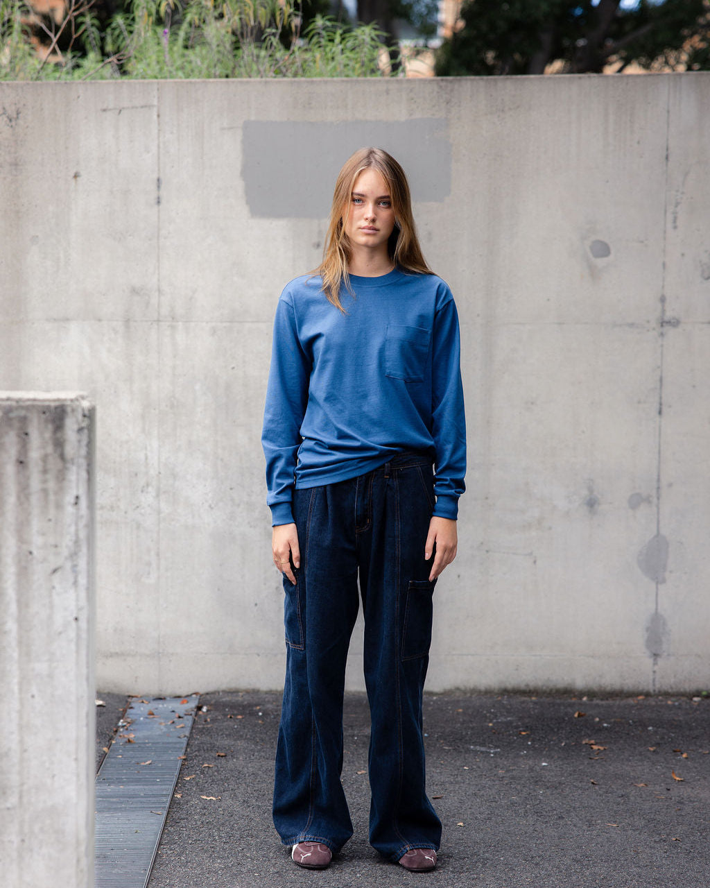 Female model wearing American Apparel Unisex Oversized Fit Super Heavyweight Long Sleeve T-shirt - Sea Blue