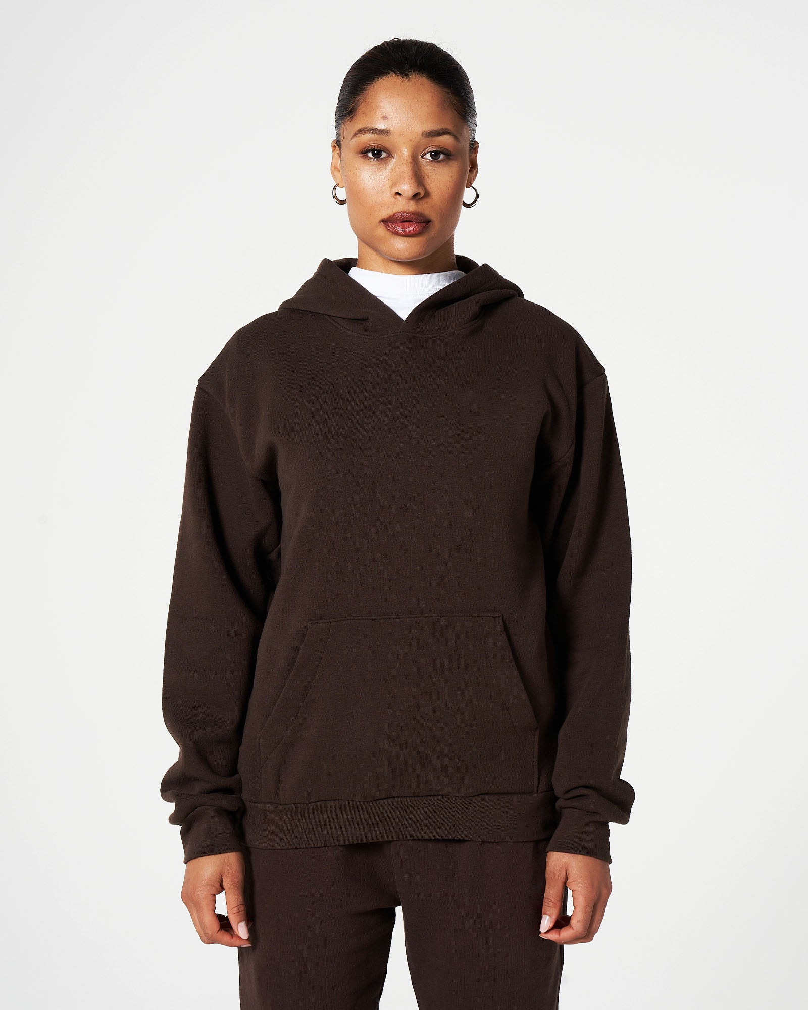 Female model wearing American Apparel Brown Hoodie & Sweatpants Tracksuit Set (front pose) -brown
