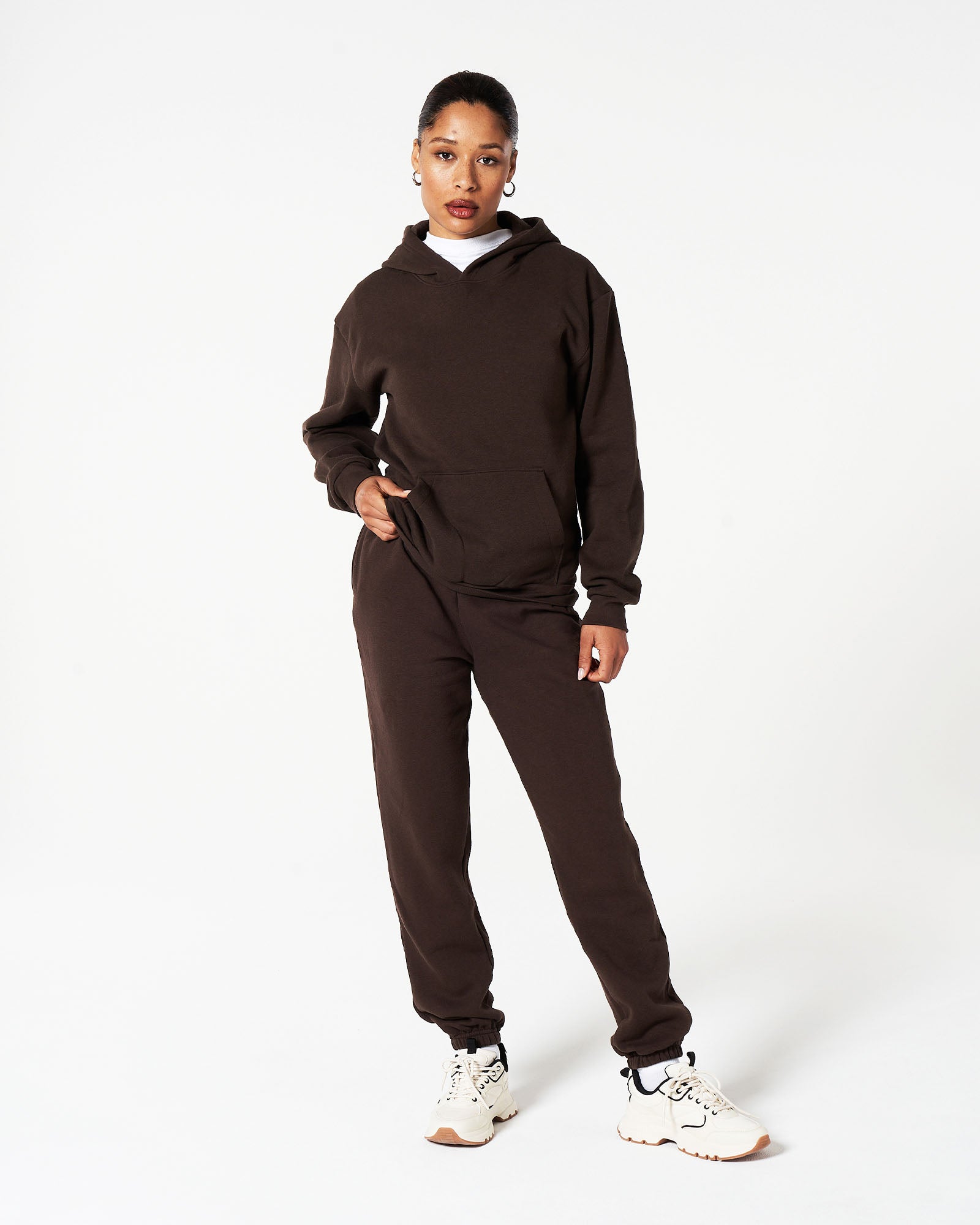 Female model wearing American Apparel Brown Hoodie & Sweatpants Tracksuit Set (front pose) -brown
