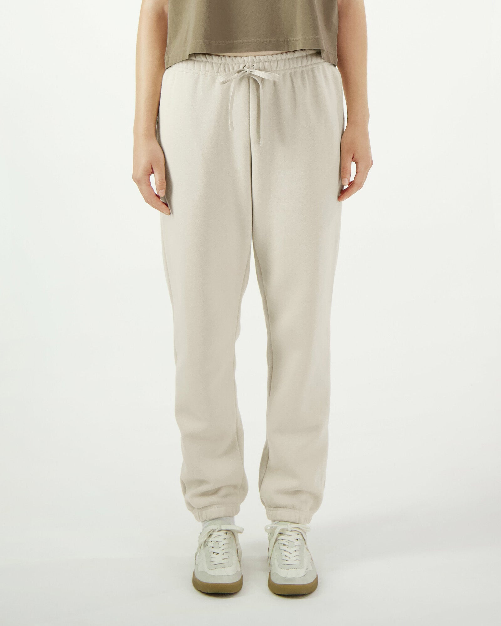 Model wearing a bone colour sweatpants(front pose)  -bone