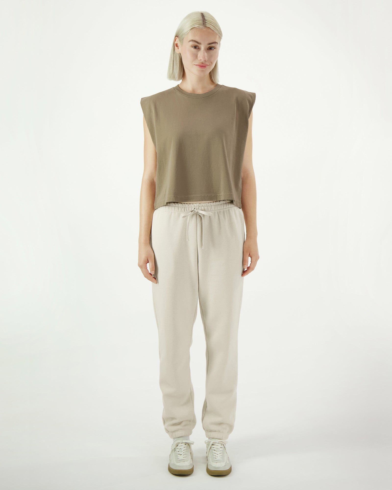 Model wearing a bone colour sweatpants (front pose) -bone