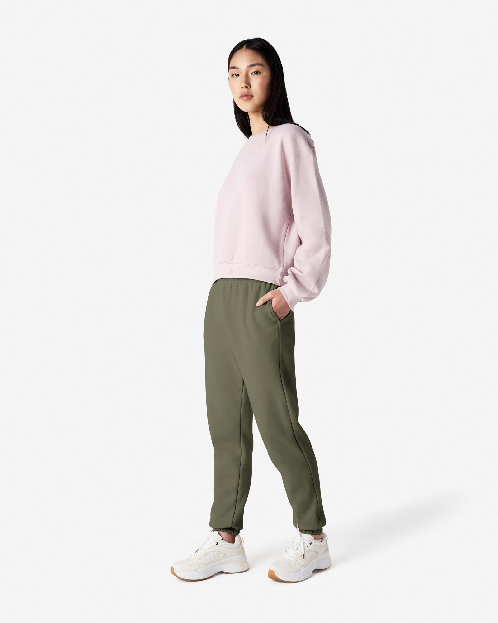 Female model wearing American Apparel Lieutenant Sweatpants (front pose) -lieutenant