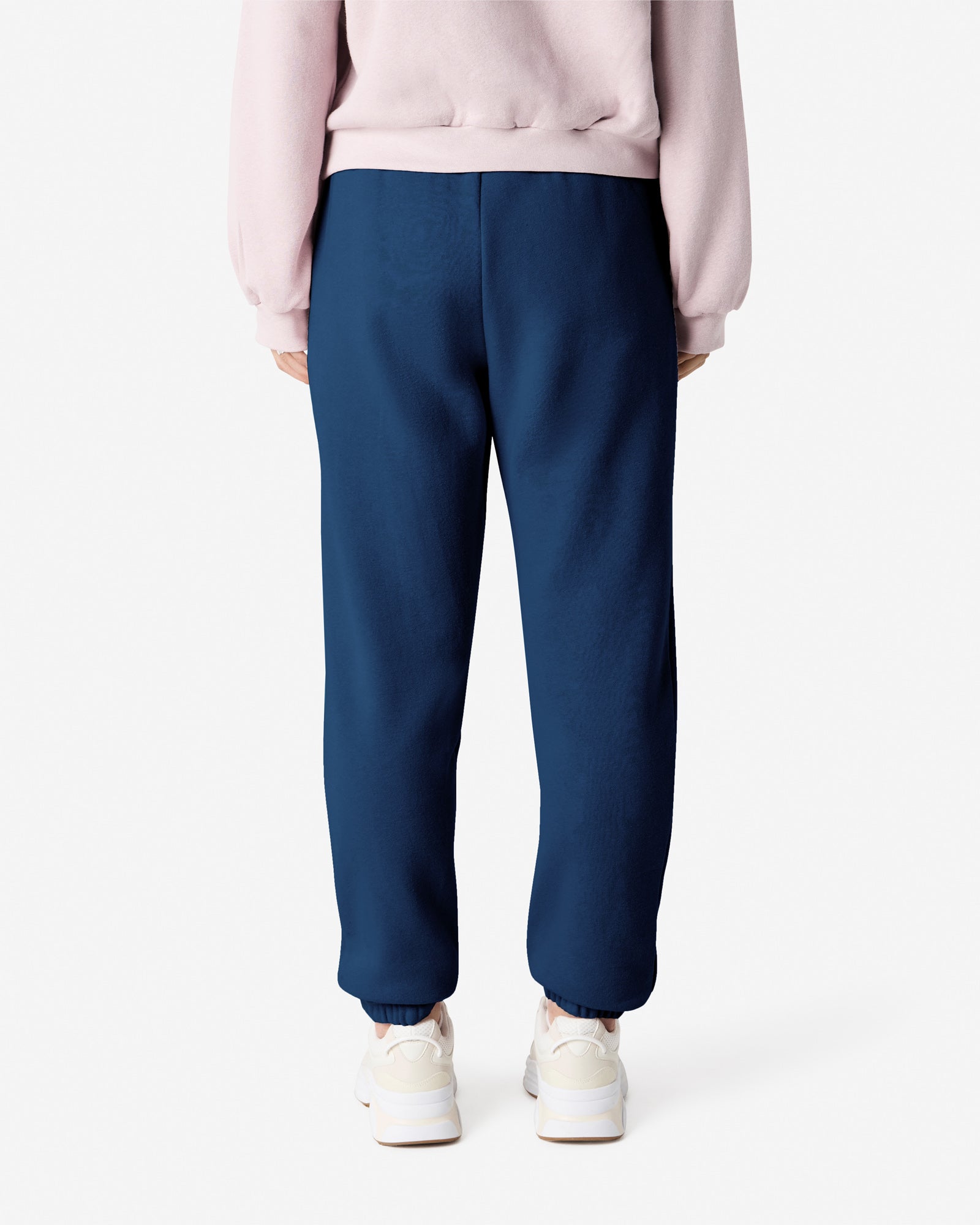 Female model wearing American Apparel Sea Blue Sweatpants (back pose) -sea blue