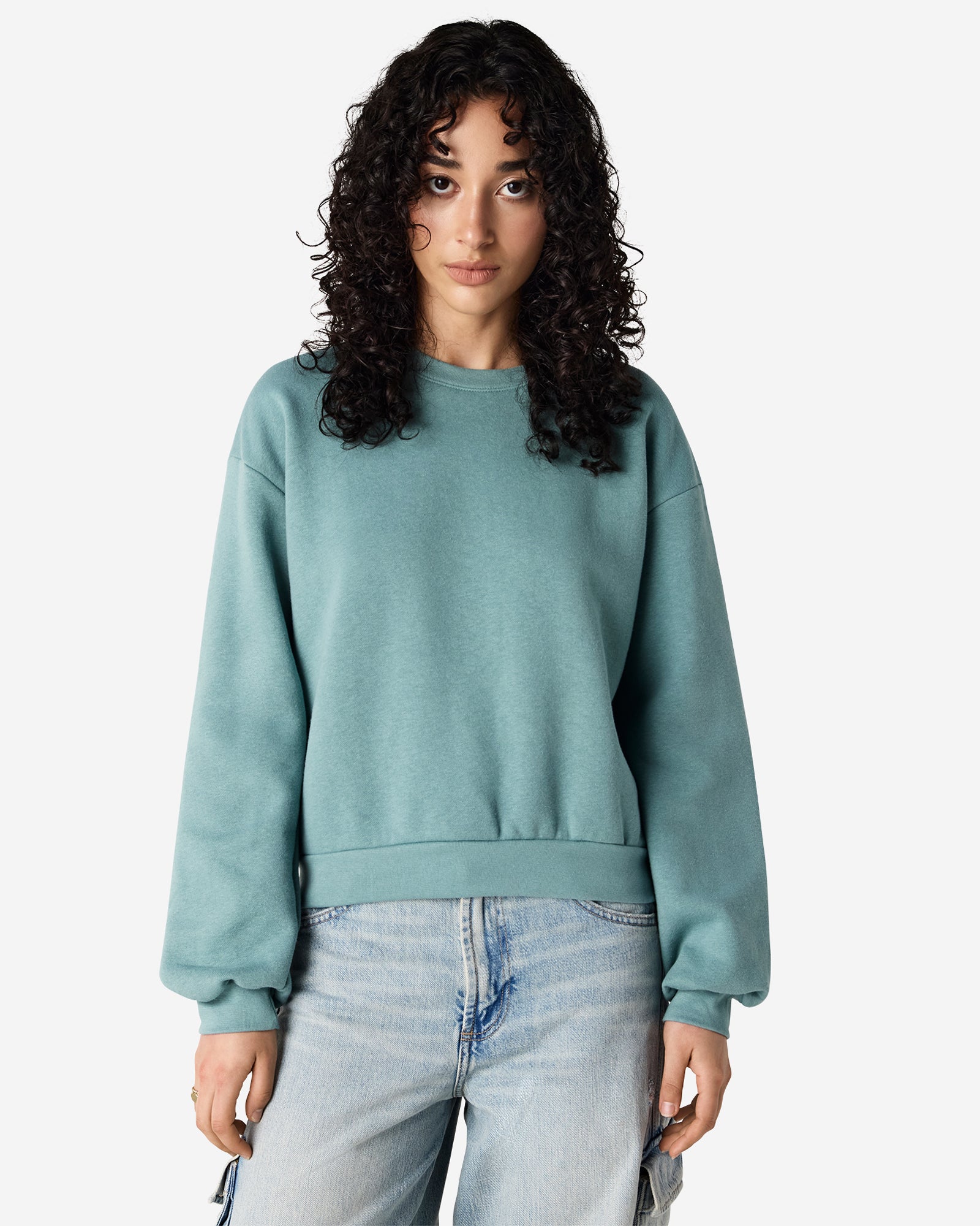 Model wearing an arctic colour sweatshirt pairing with blue jeans (front pose) -arctic
