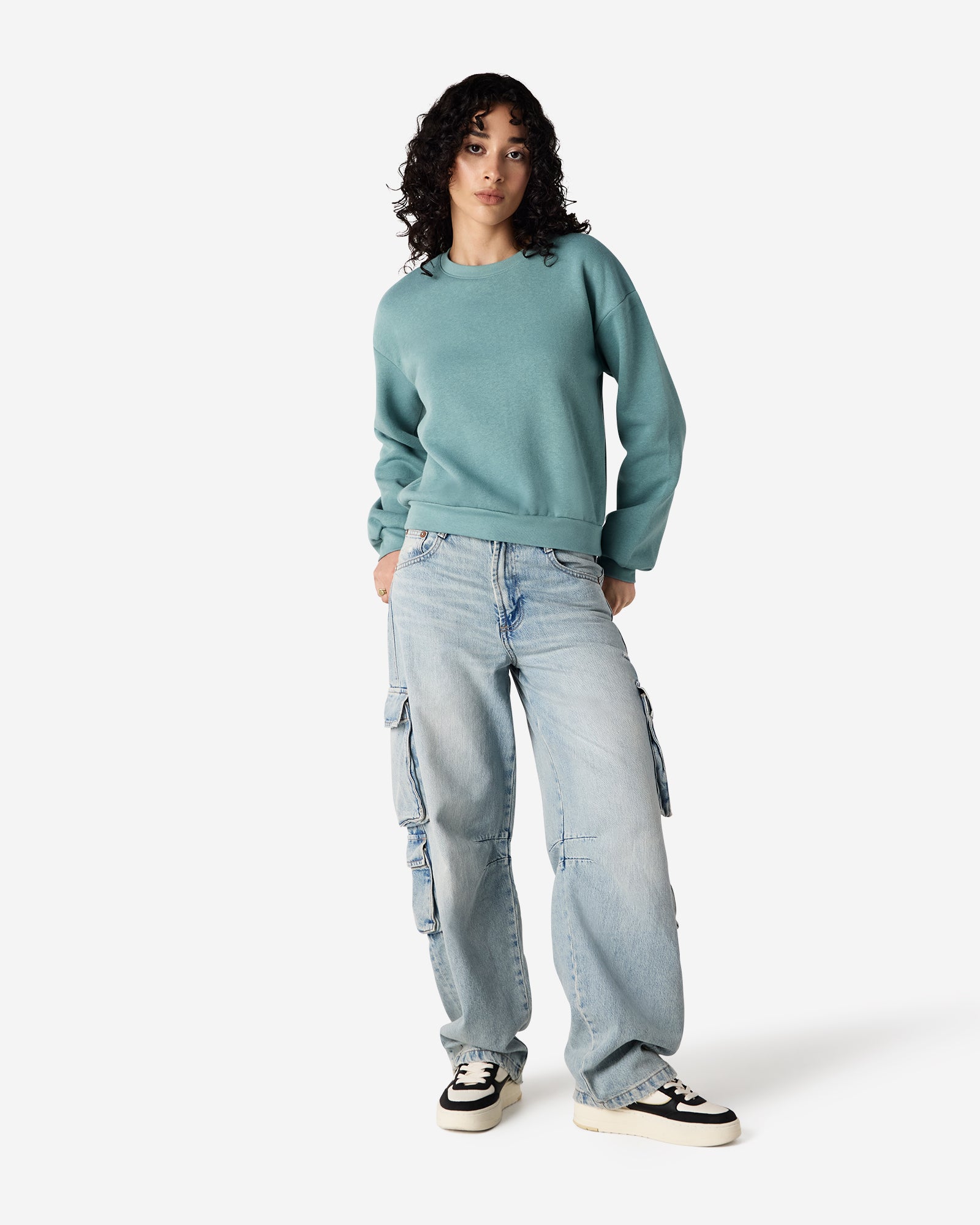 Model wearing an arctic colour sweatshirt pairing with blue jeans (front pose) -arctic