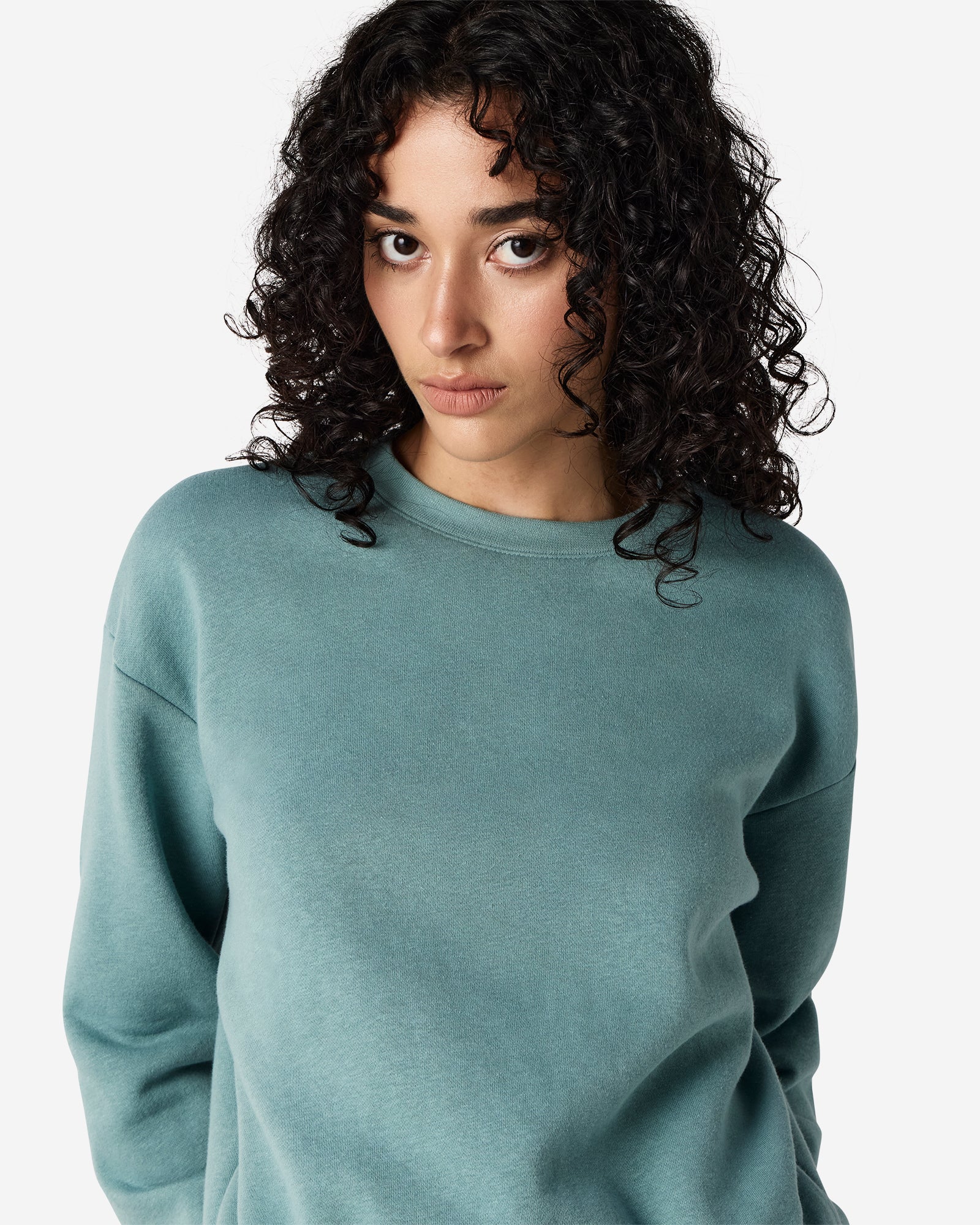 Model wearing an arctic colour sweatshirt pairing with blue jeans (front pose) -arctic