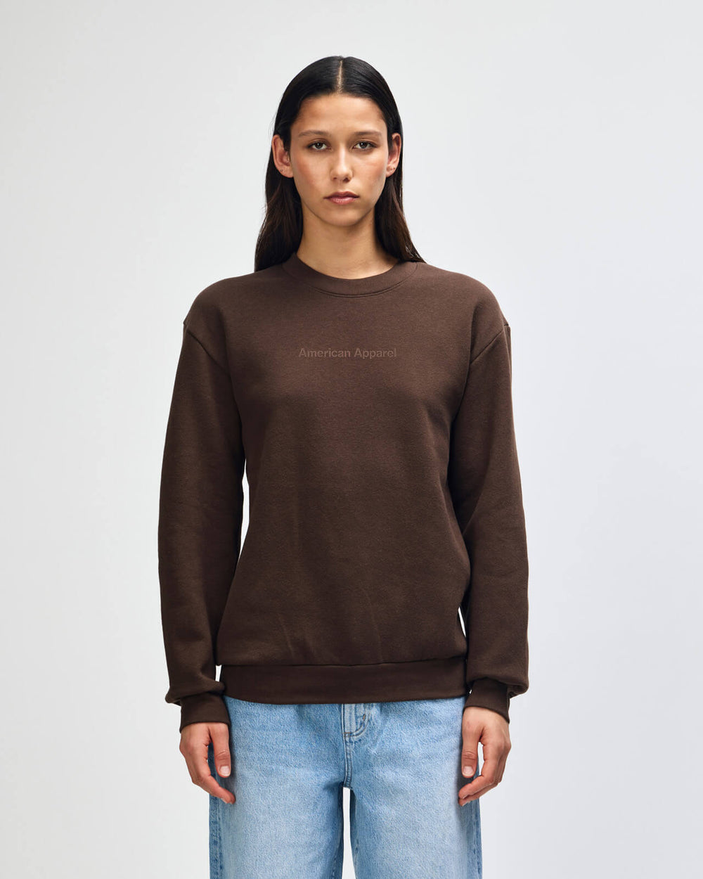 image of Crewneck Sweatshirt Tracksuit Set - Embroidered Logo - Brown : Person wearing a brown sweatshirt and blue jeans on a plain background -brown