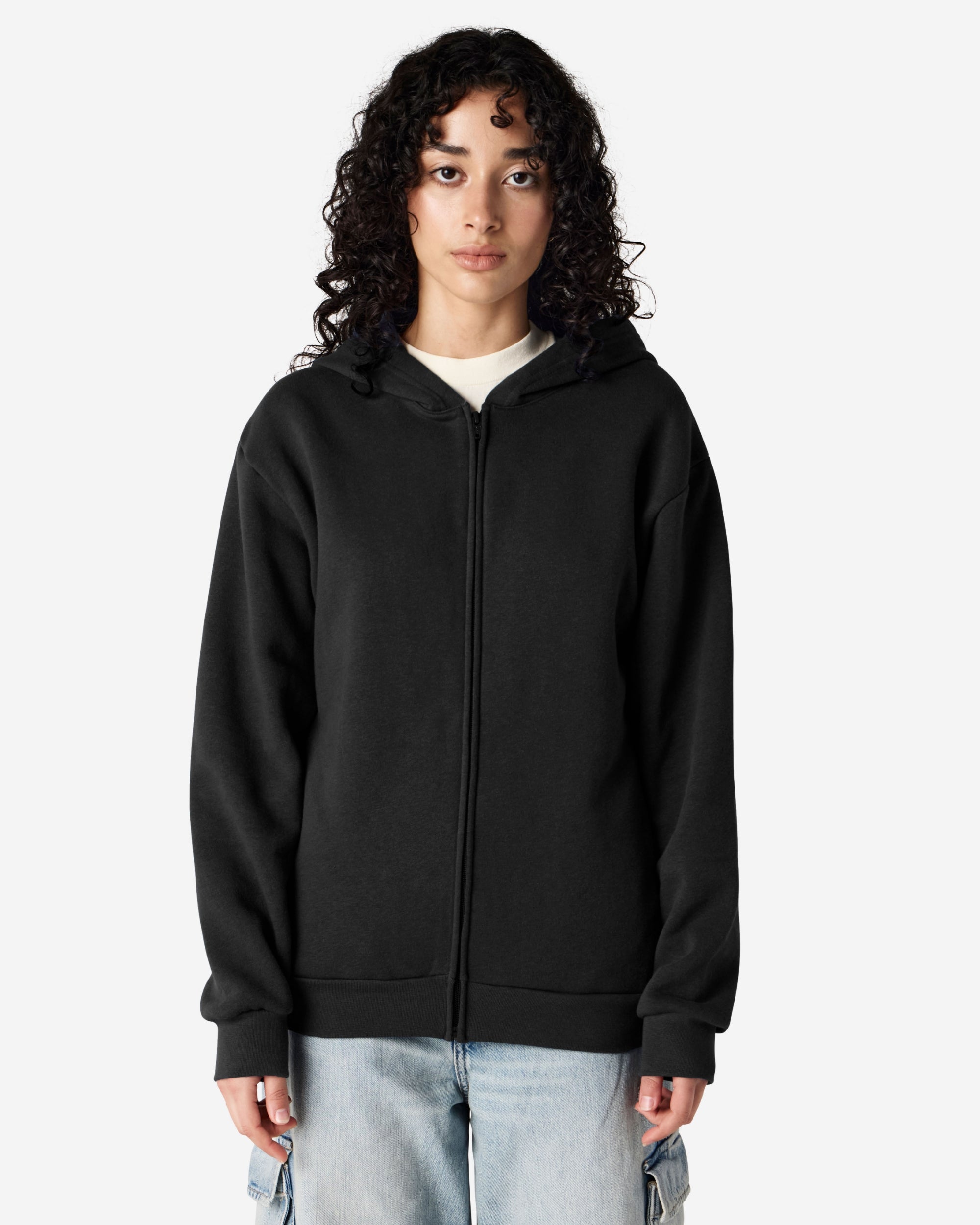 Female model wearing Reflex Unisex Full Zip Hooded Sweatshirt pairing with blue jeans (front pose) -black
