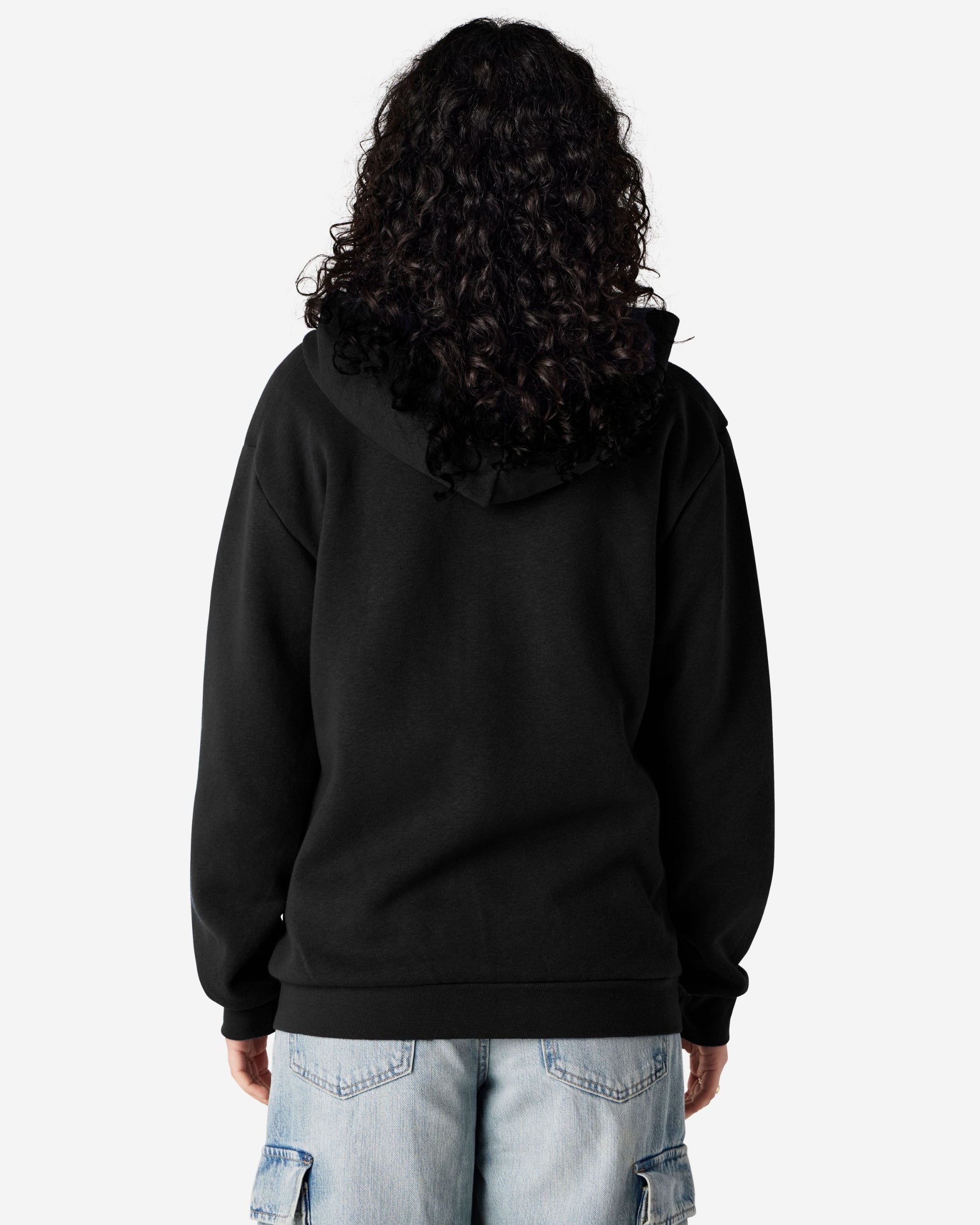 Female model wearing Reflex Unisex Full Zip Hooded Sweatshirt pairing with blue jeans (front pose) -black