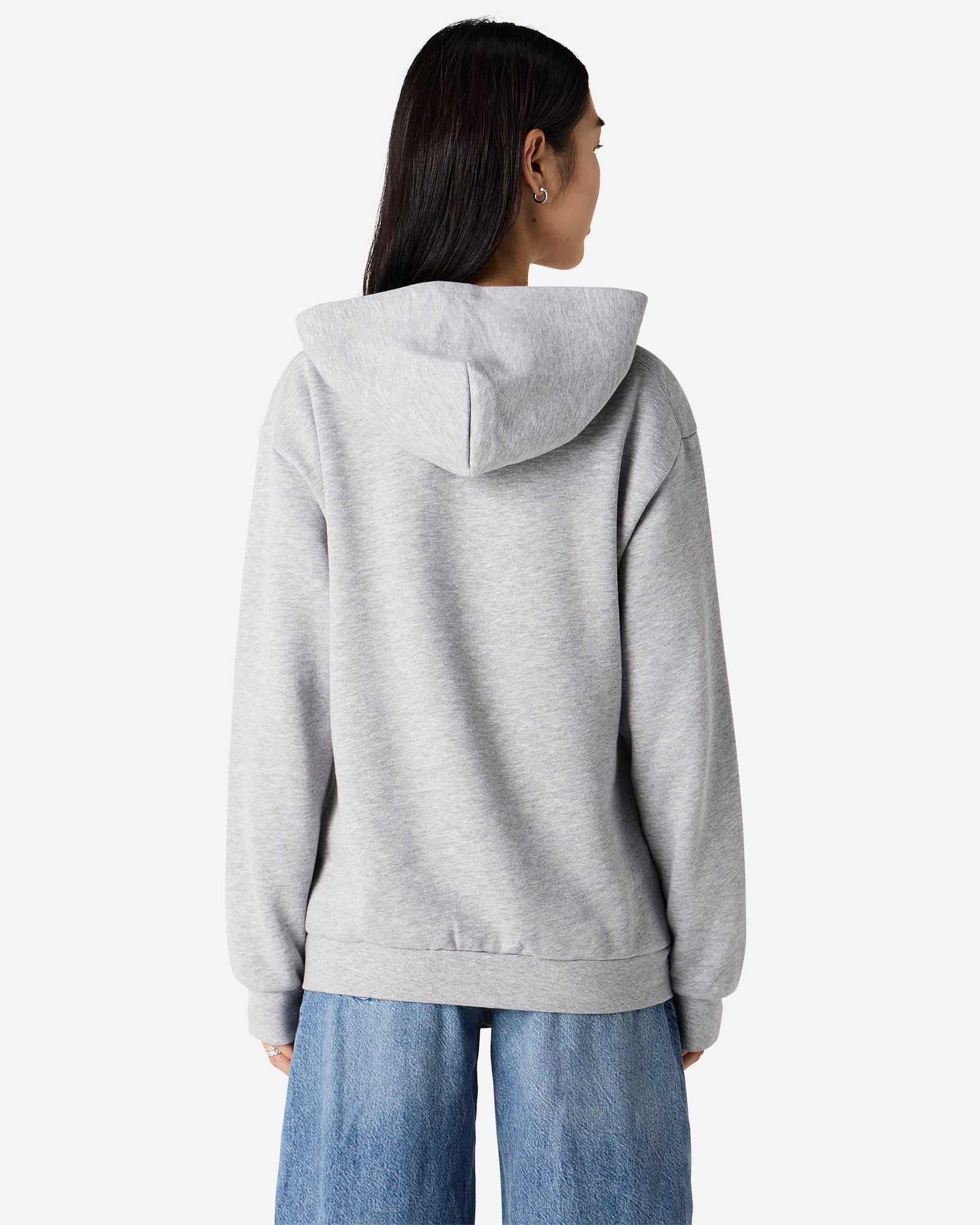 Female model wearing Reflex Unisex Full Zip Hooded Sweatshirt pairing with blue jeans (back pose) -heather grey