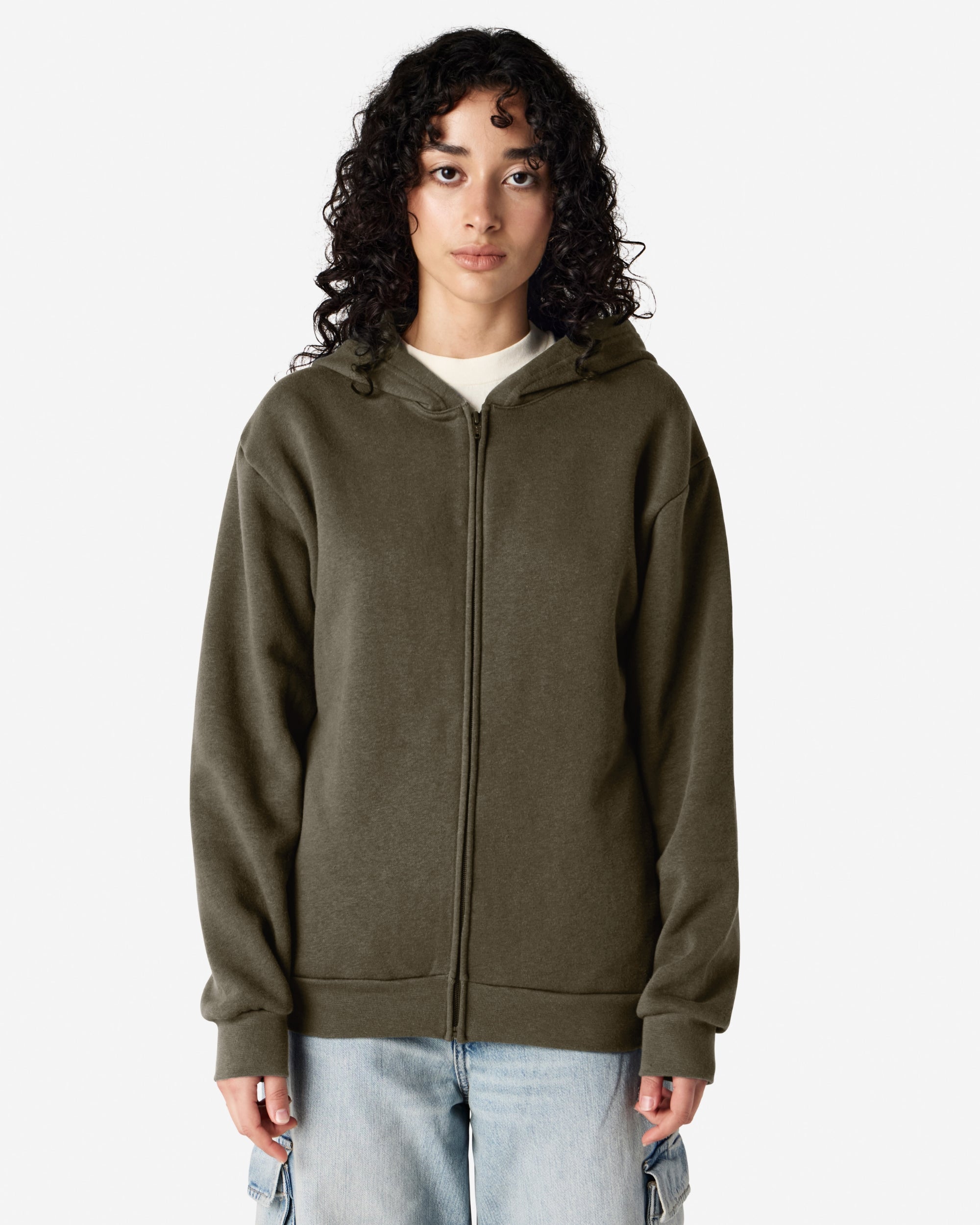 Female model wearing Reflex Unisex Full Zip Hooded Sweatshirt pairing with blue jeans (front pose) -lieutenant