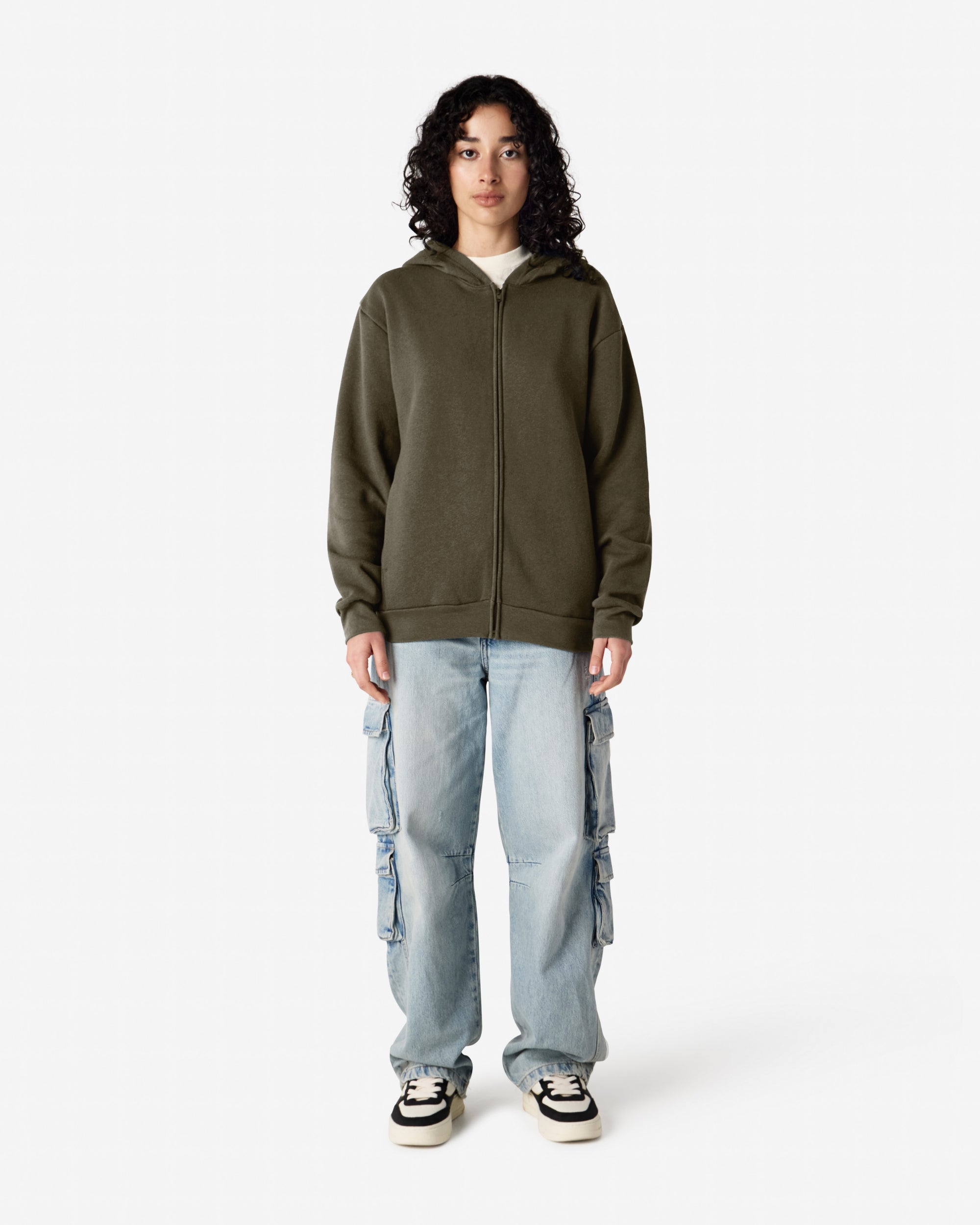 Female model wearing Reflex Unisex Full Zip Hooded Sweatshirt pairing with blue jeans (front pose) -lieutenant