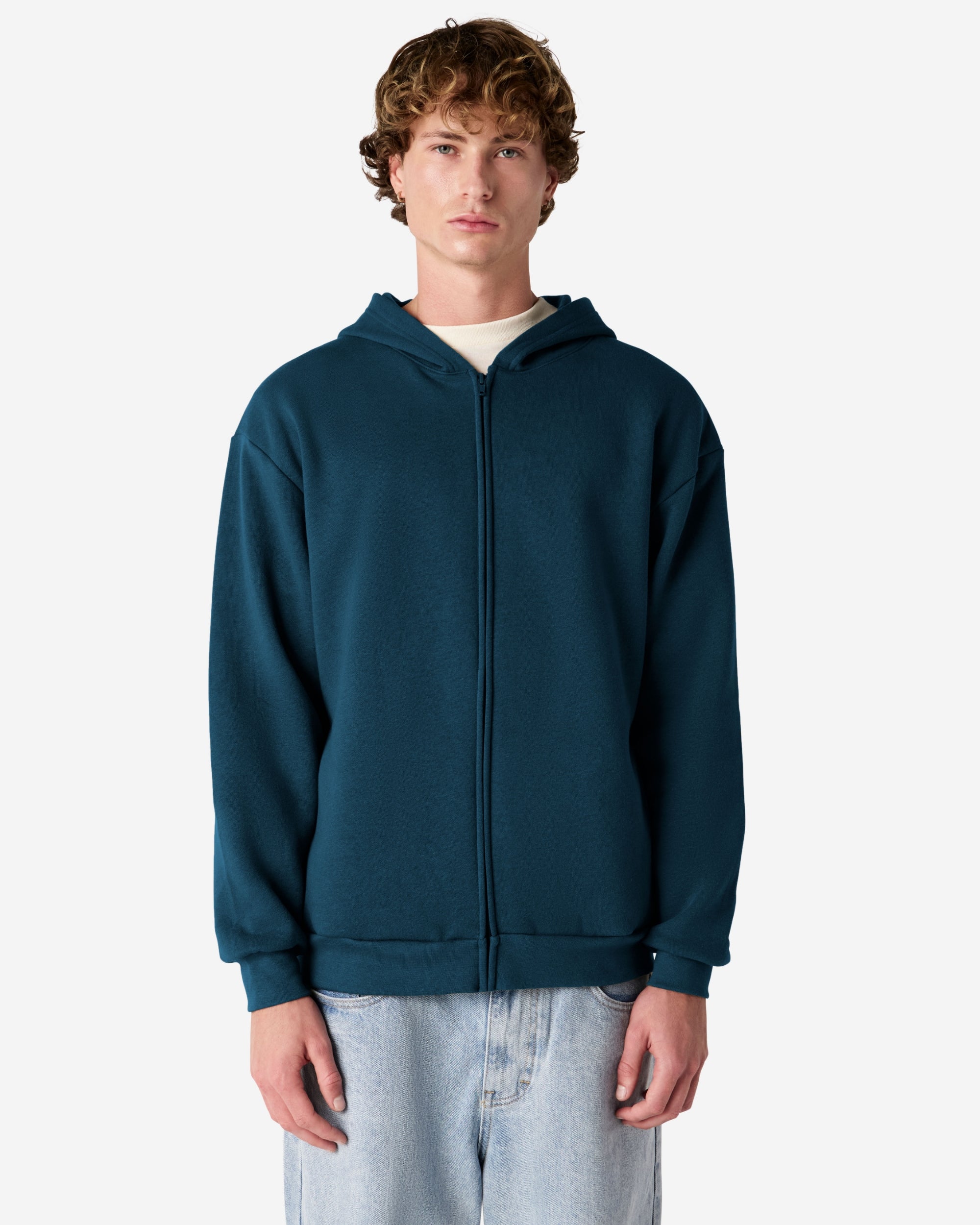 Male model wearing Reflex Unisex Full Zip Hooded Sweatshirt pairing with blue jeans (front pose) -sea blue
