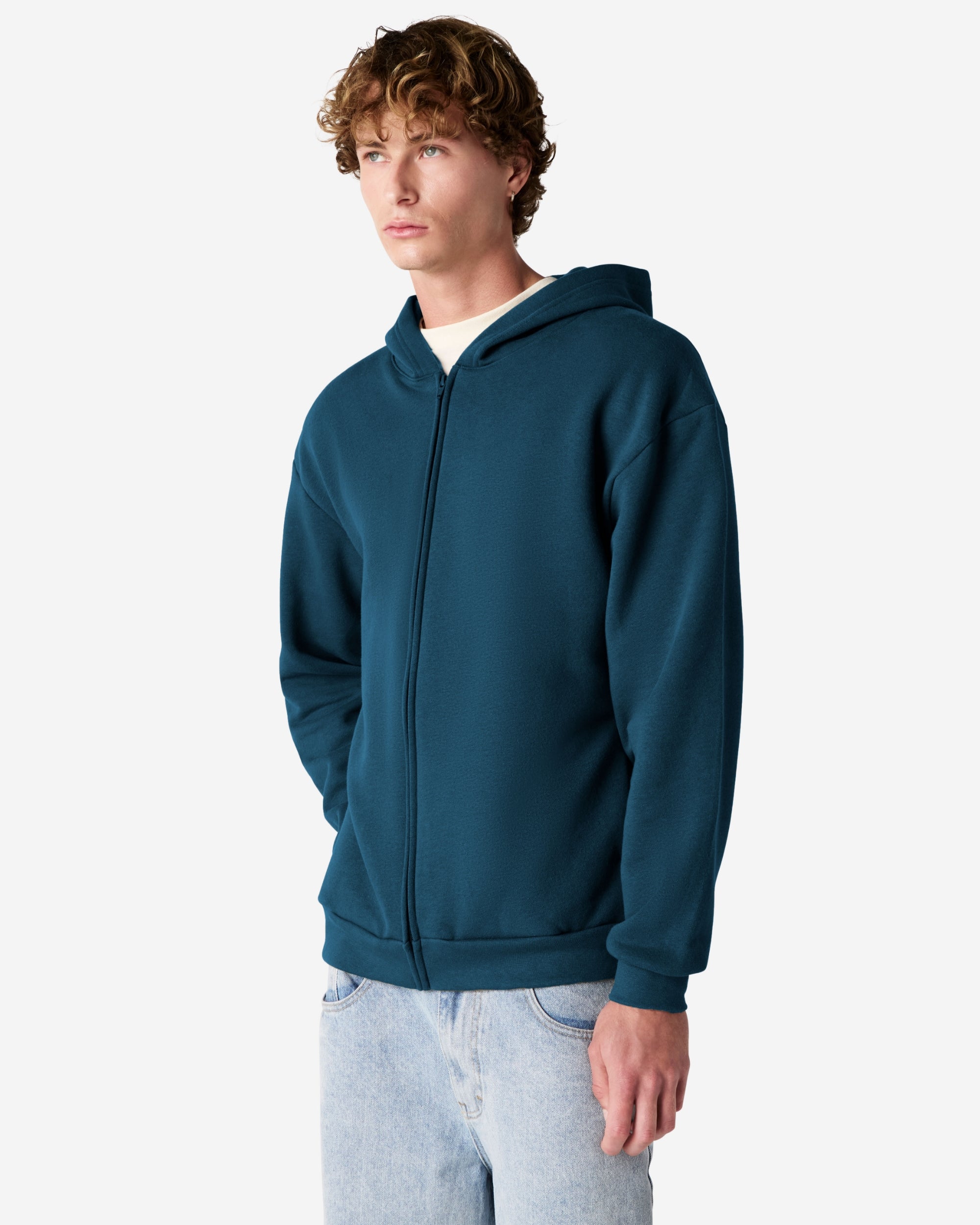 Male model wearing Reflex Unisex Full Zip Hooded Sweatshirt pairing with blue jeans (front pose) -sea blue