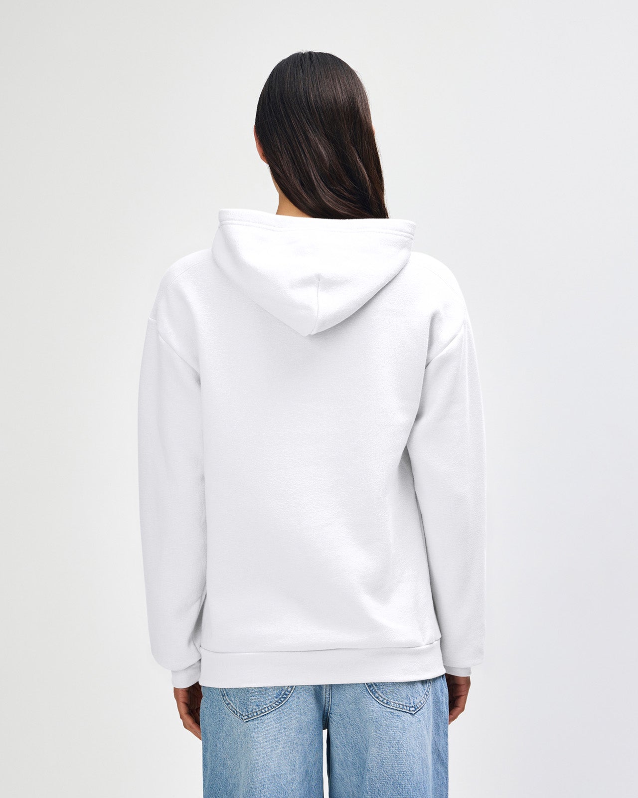 Female model wearing a Reflex Unisex Hooded Sweatshirt (back pose) -white
